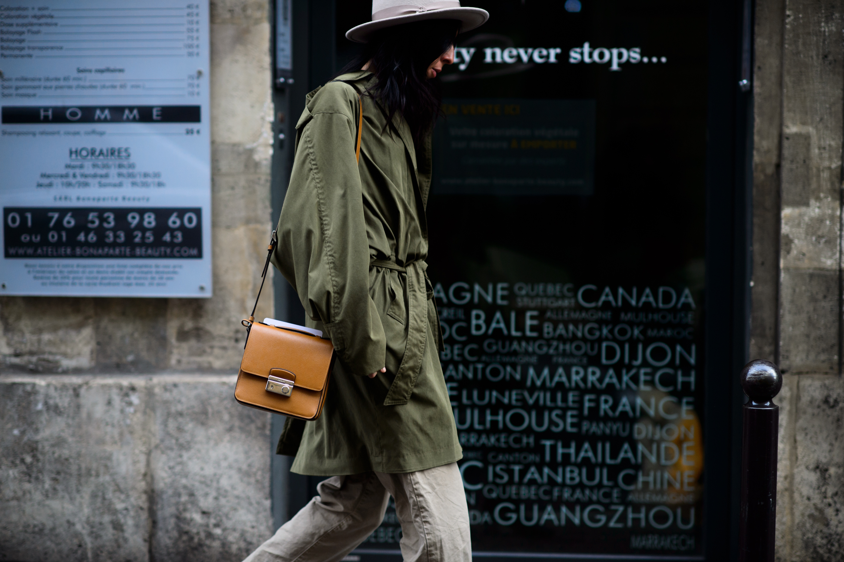 Woman wearing khaki parka after the show
