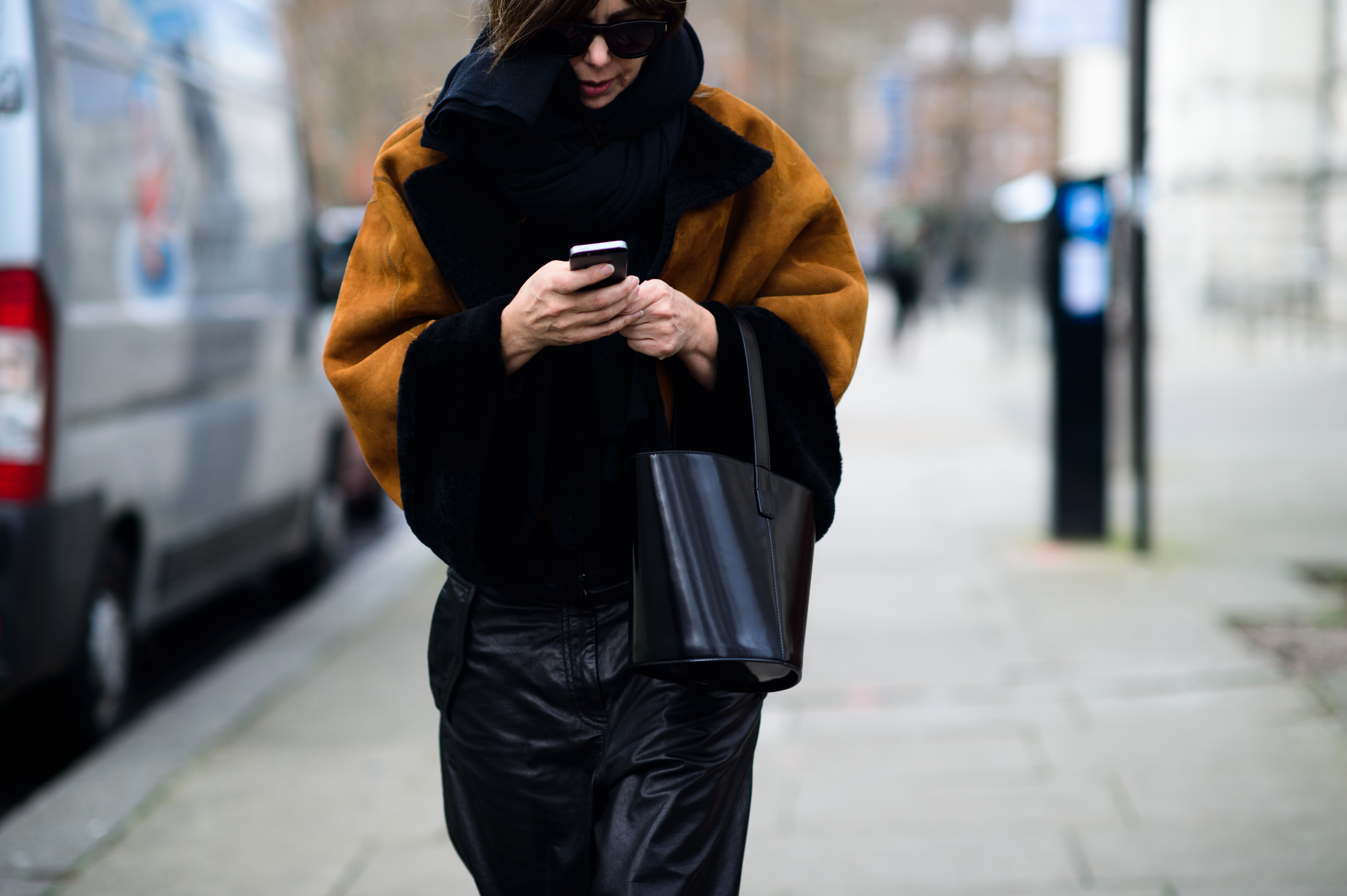 Woman wearing suede jacket