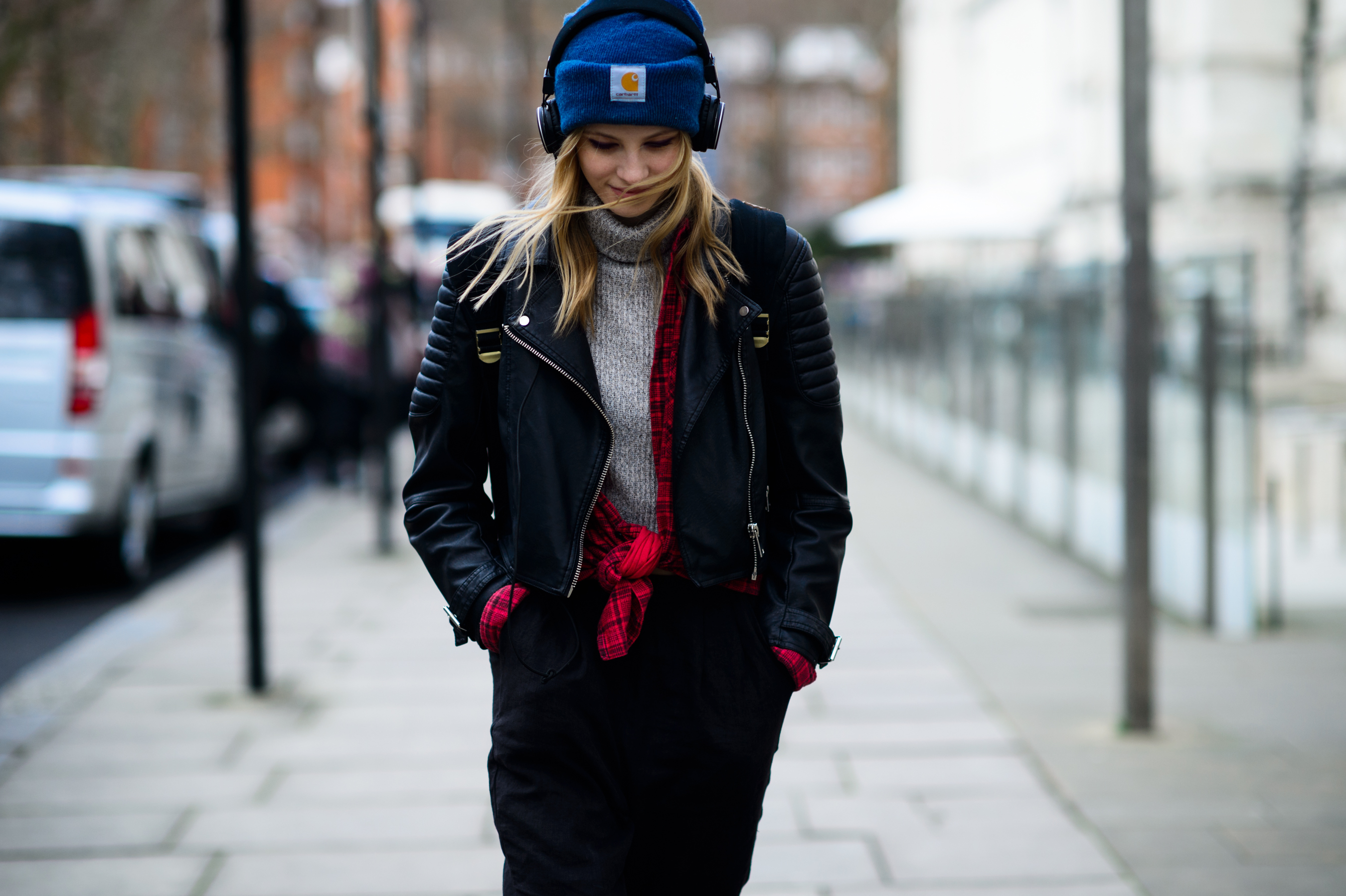 Model wearing blue hat after the show