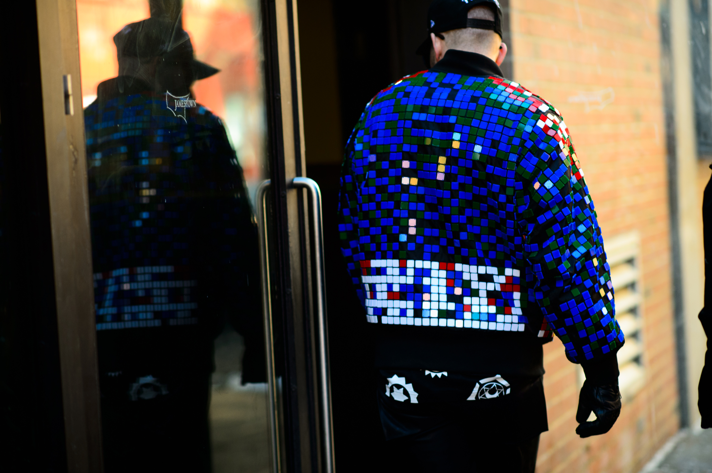 Man wearing pixelated jacket