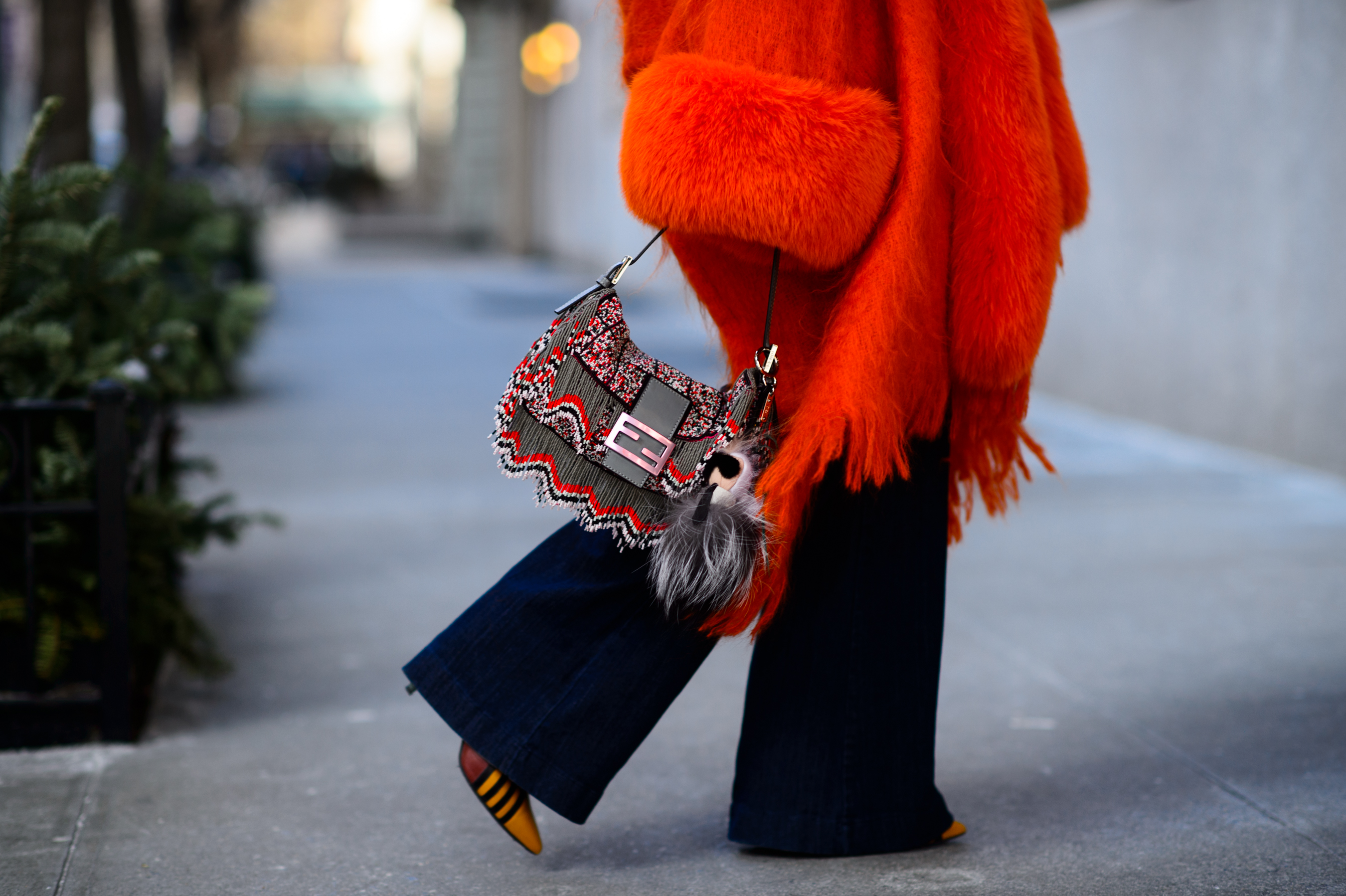 Woman wearing red fur coat