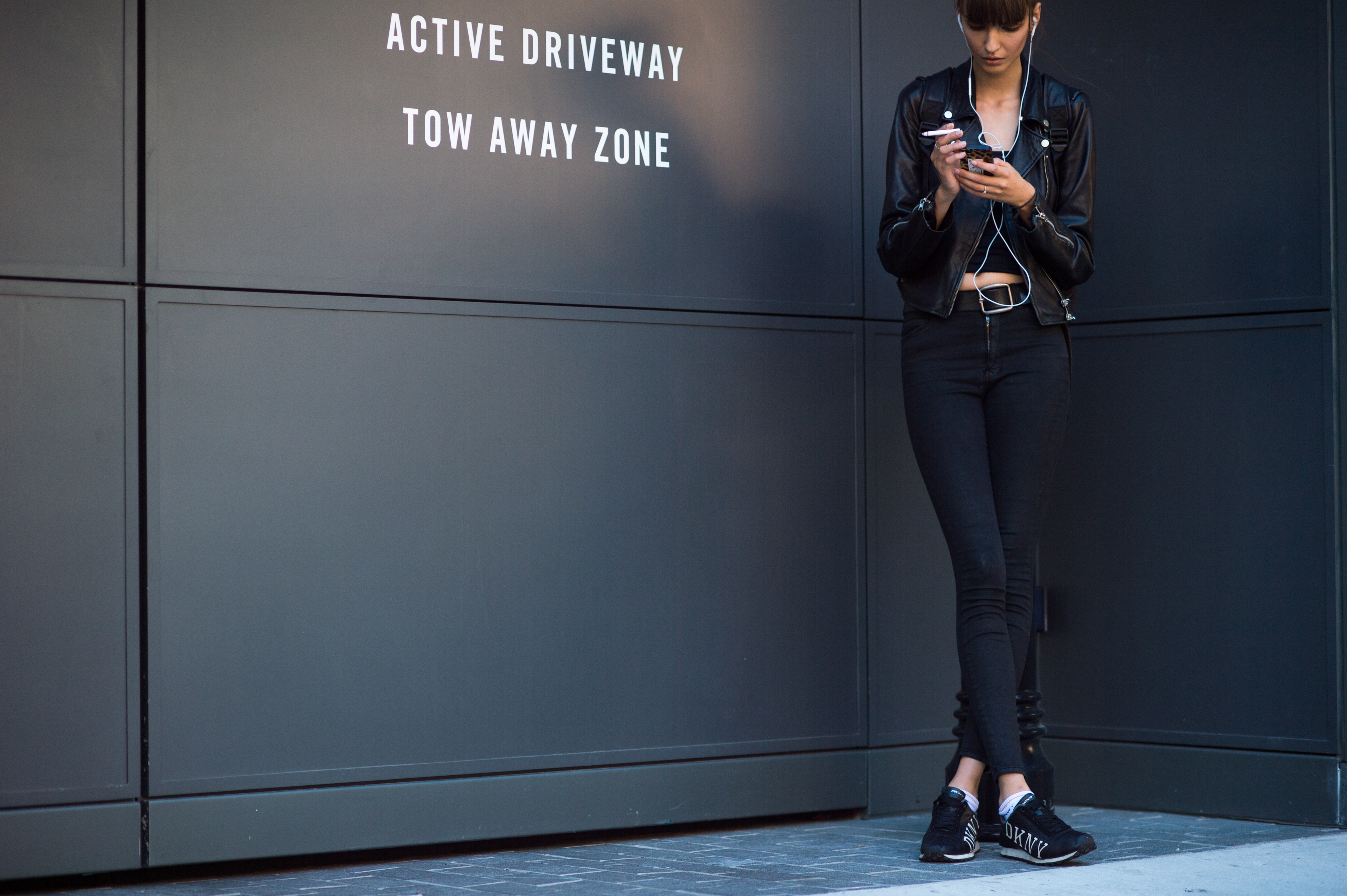 Model wearing black leather jacket