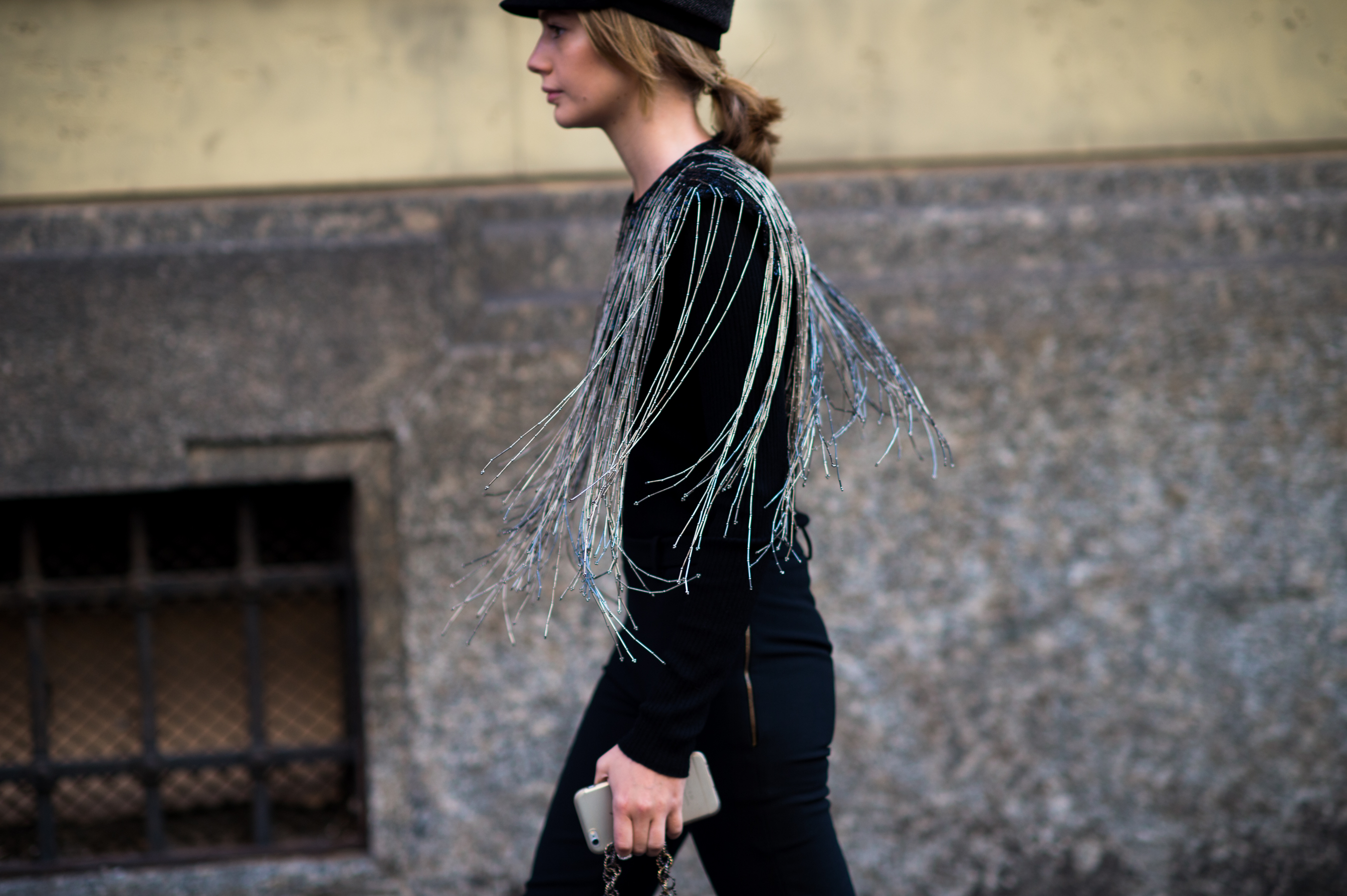Ukrainian stylist wearing top with metal chains
