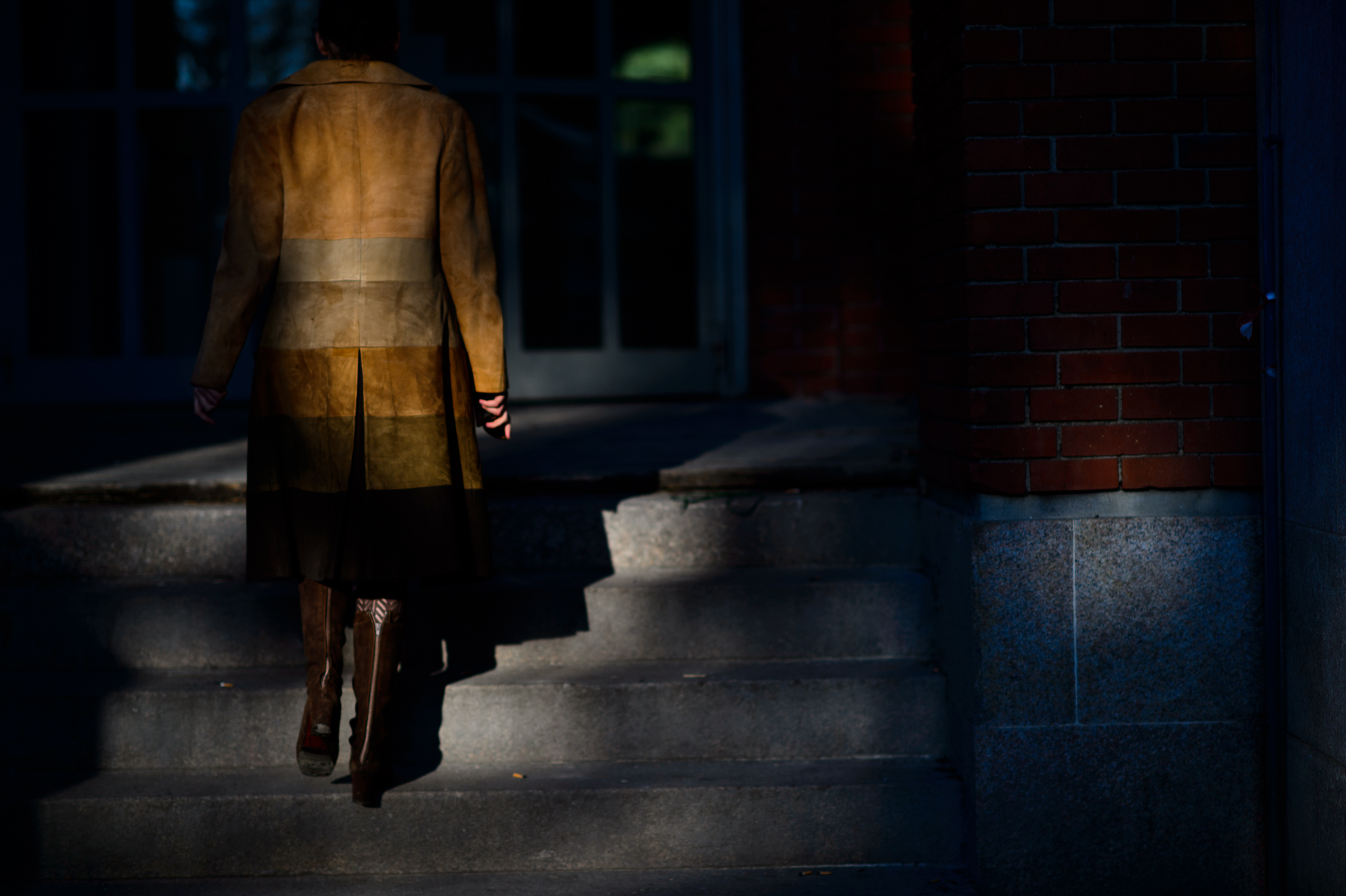 Romanian photographer wearing suede coat