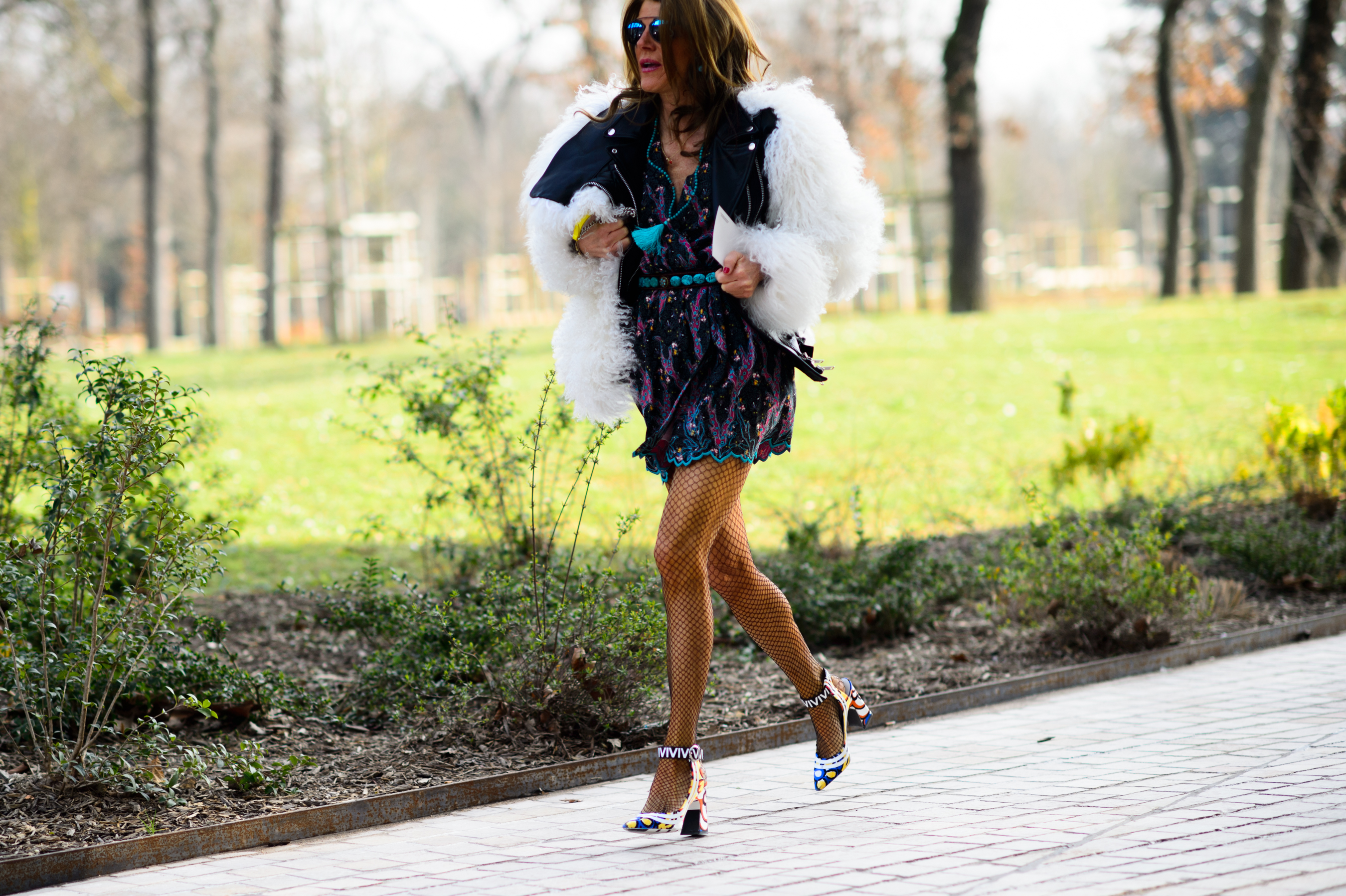 Japanese Vogue editor wearing jacket with furry sleeves