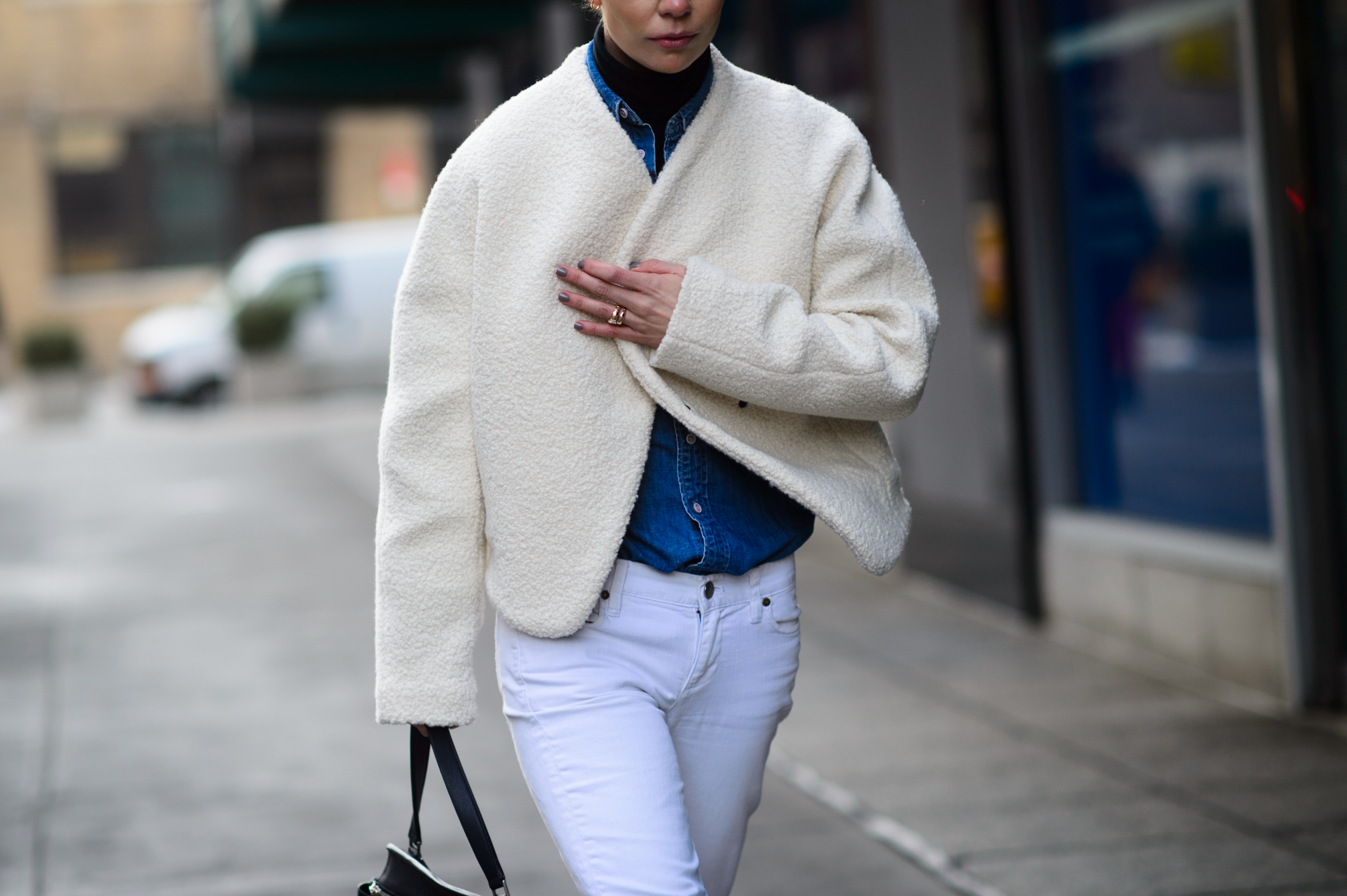 Woman wearing white jacket