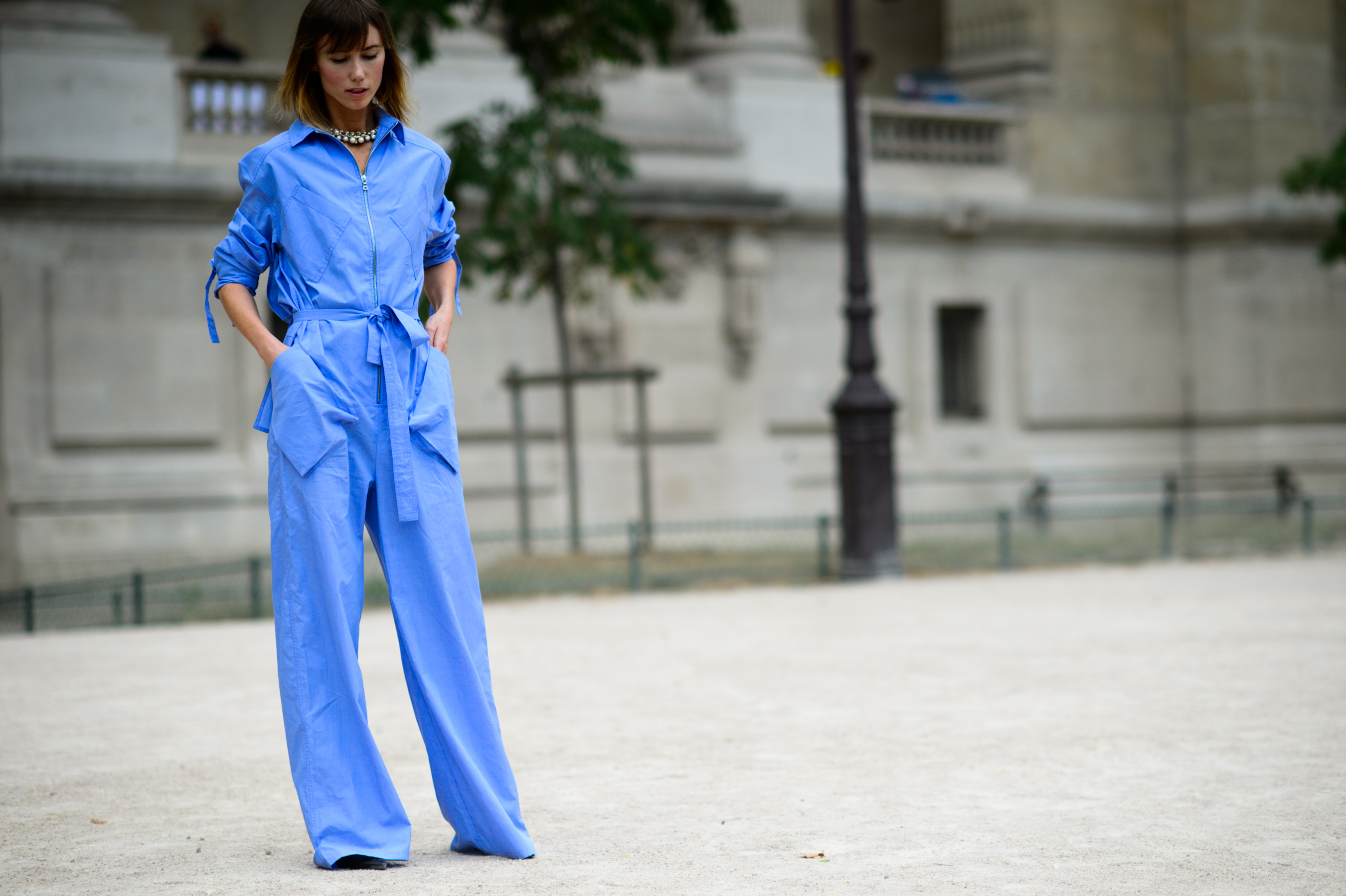 Russian editor and stylist wearing blue cotton jumpsuit