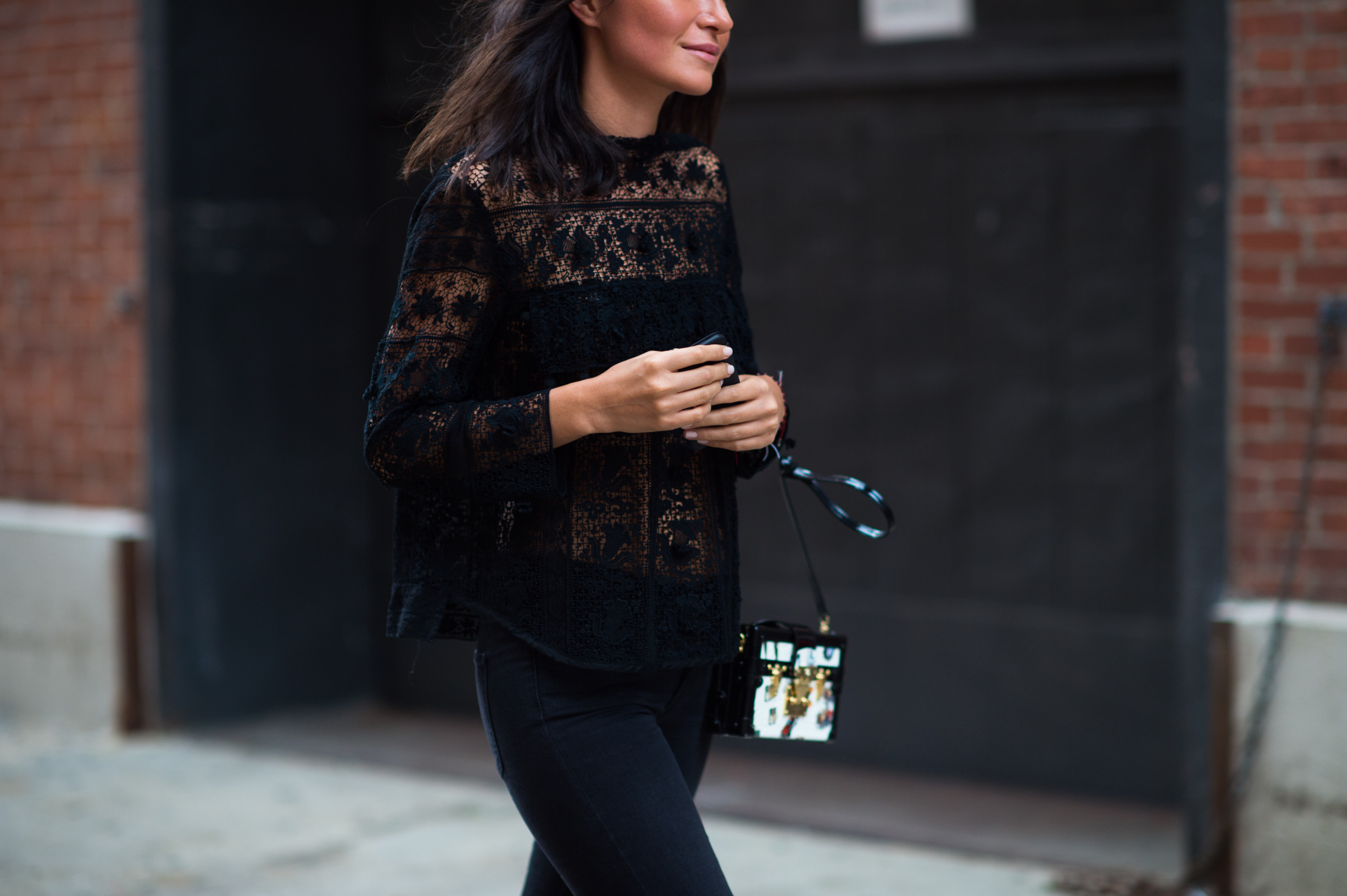 Kazakh stylist wearing black lace top