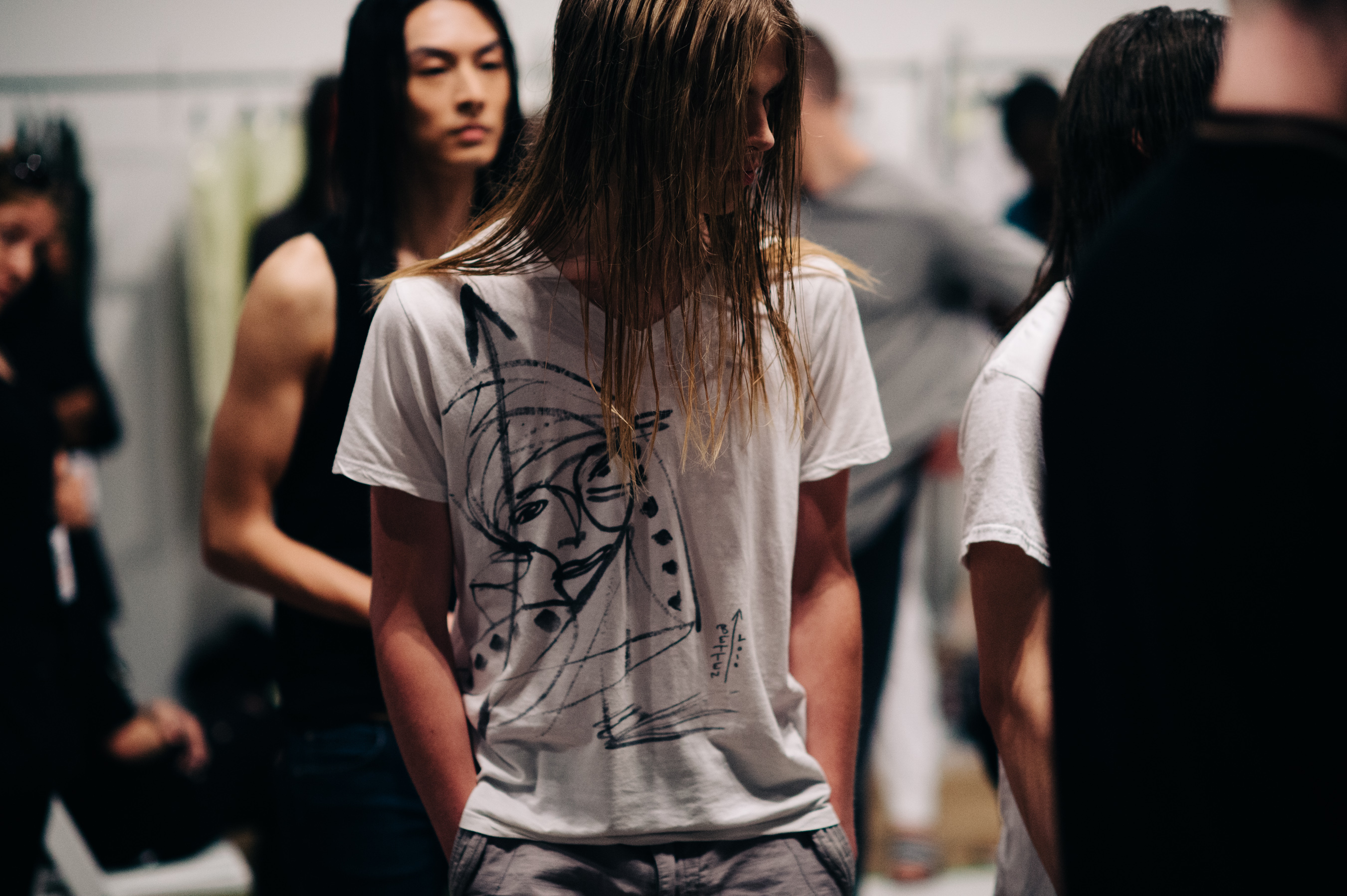 Model with long hair before the show