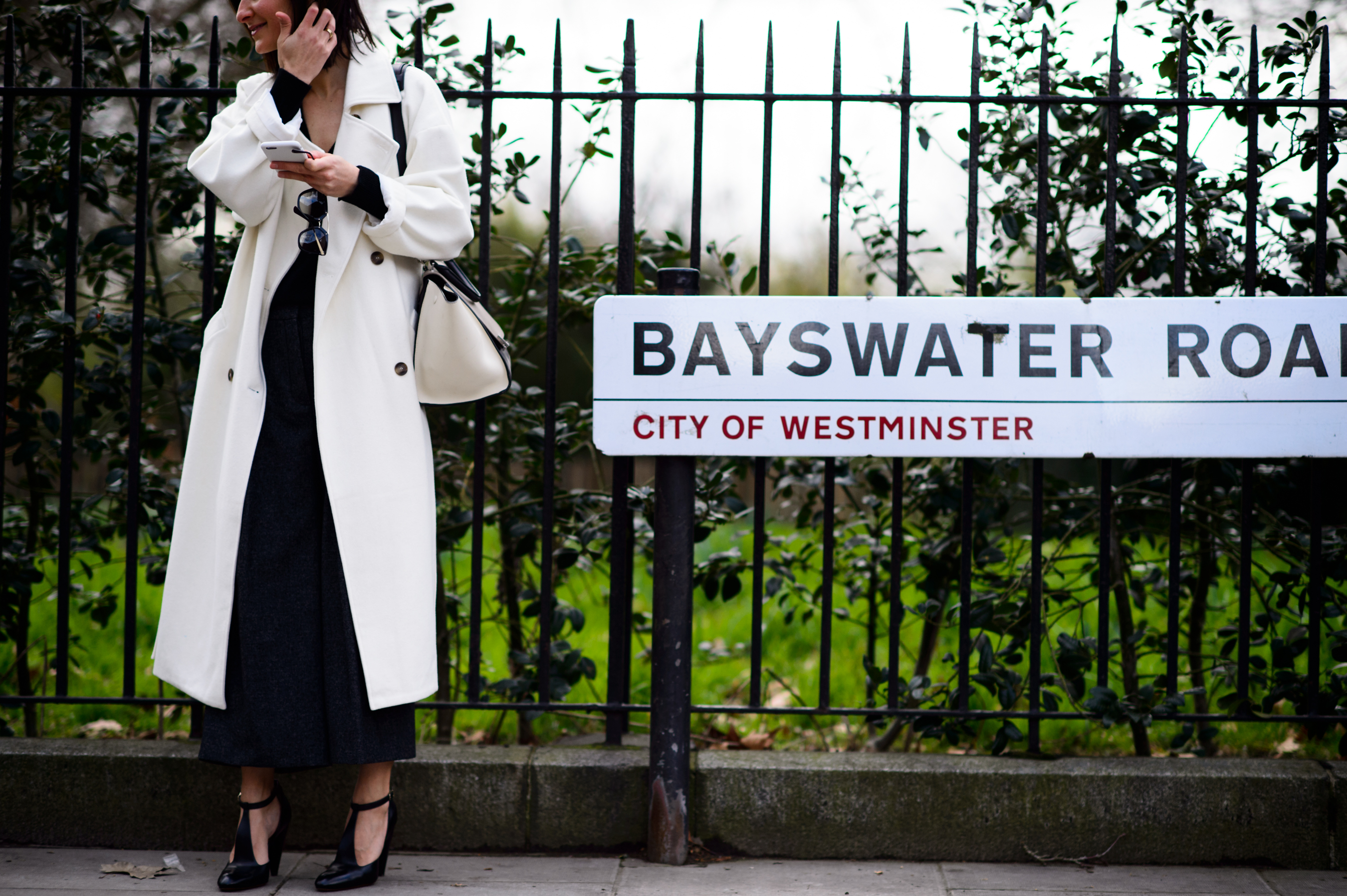 Woman wearing white coat