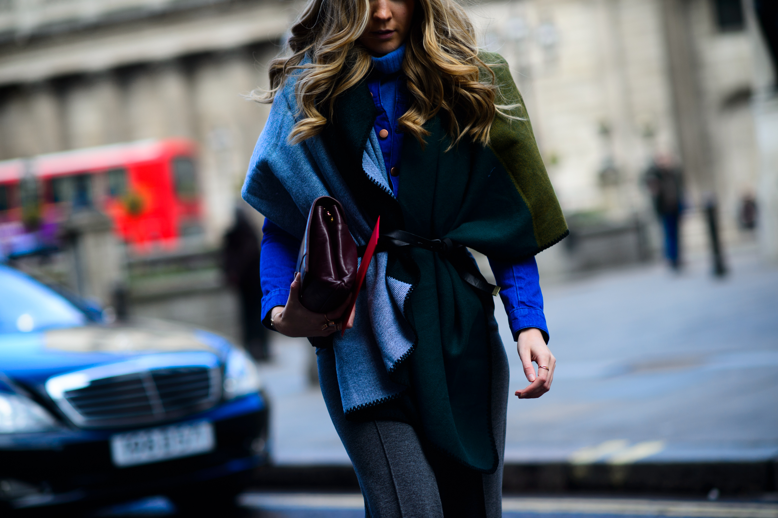 Woman wearing scarf and belt