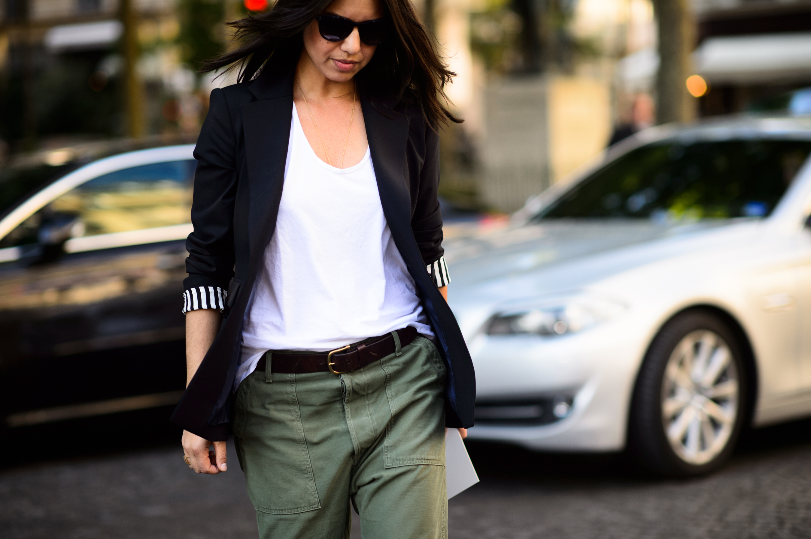 Woman wearing jacket over white t-shirt