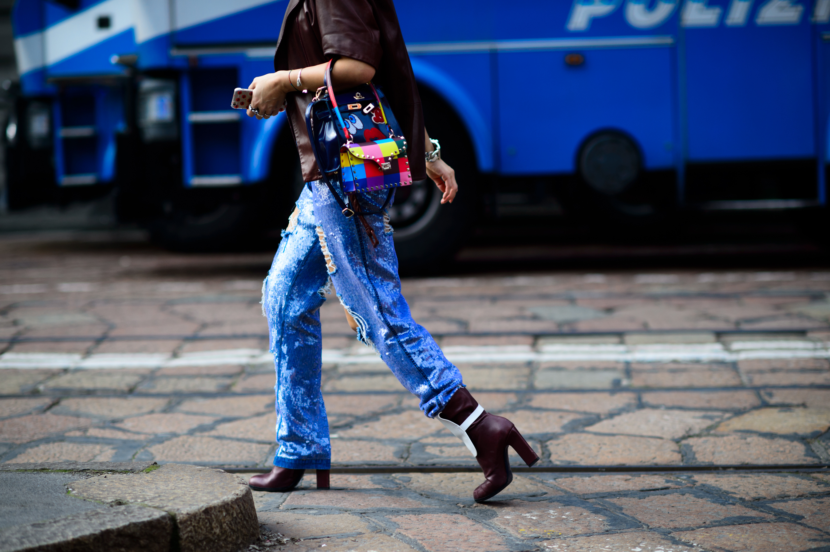 Woman wearing jeans and boots after the show