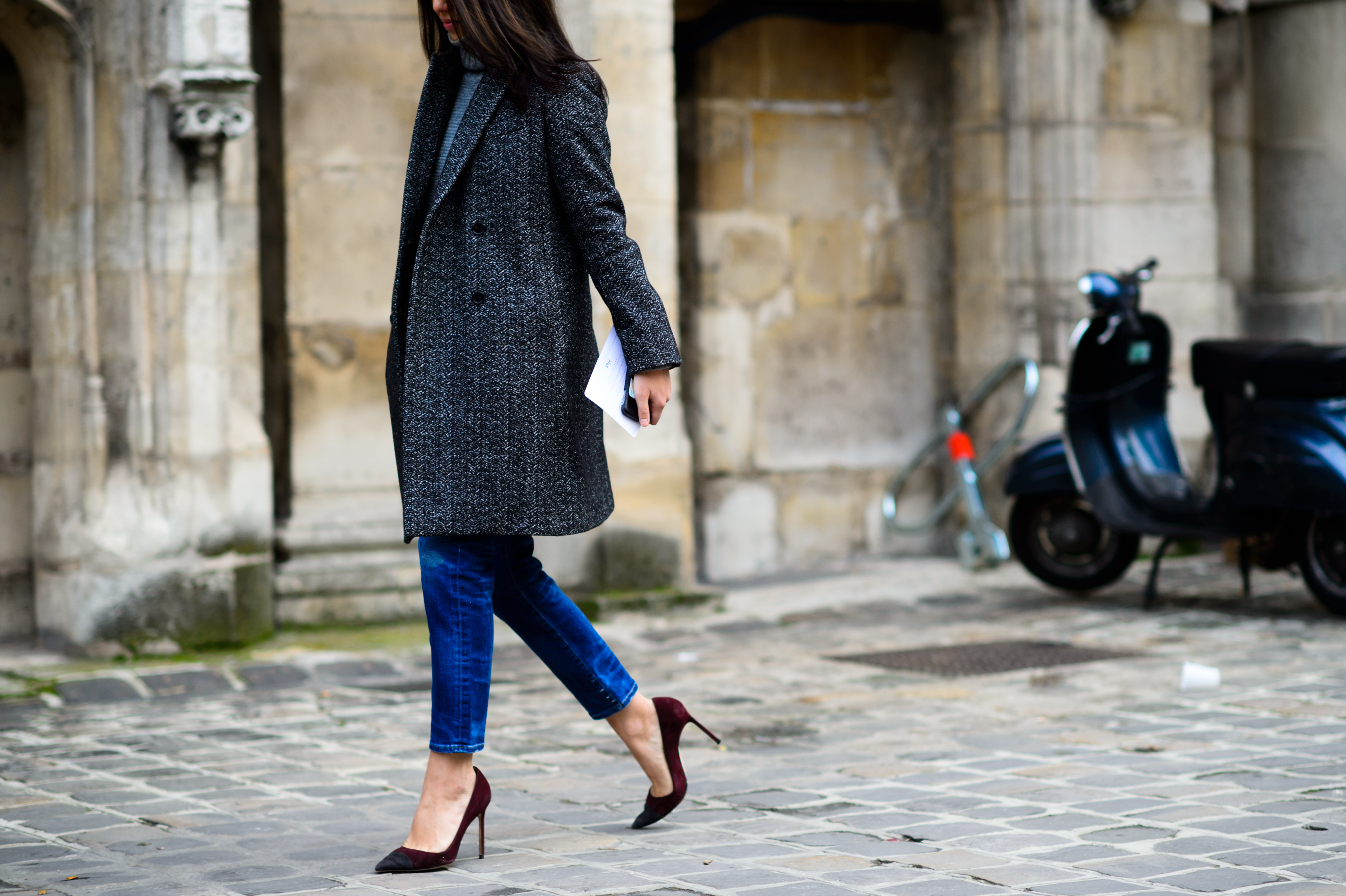 Woman wearing jeans and stilletos