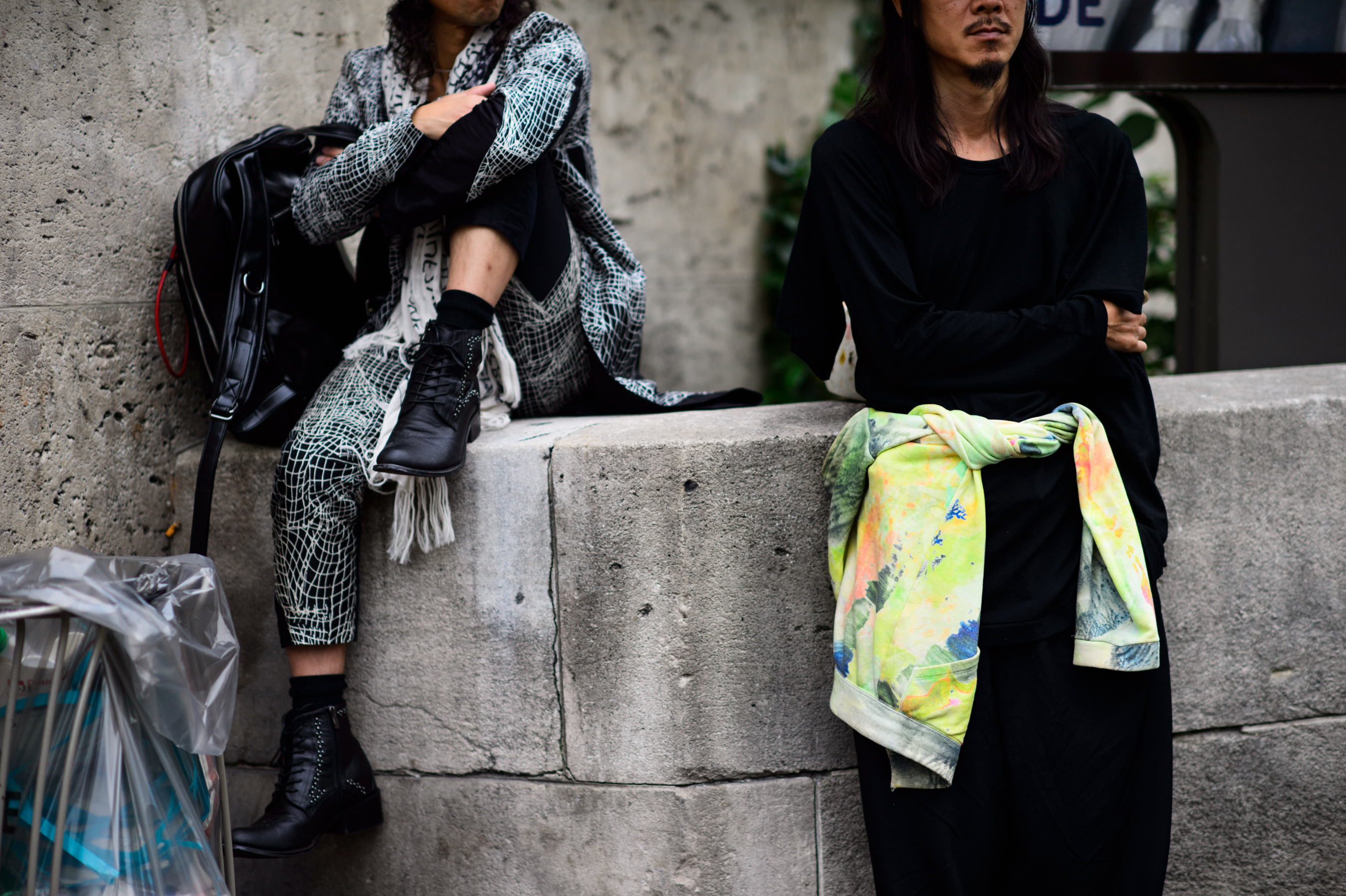 Two men seating at the show venue