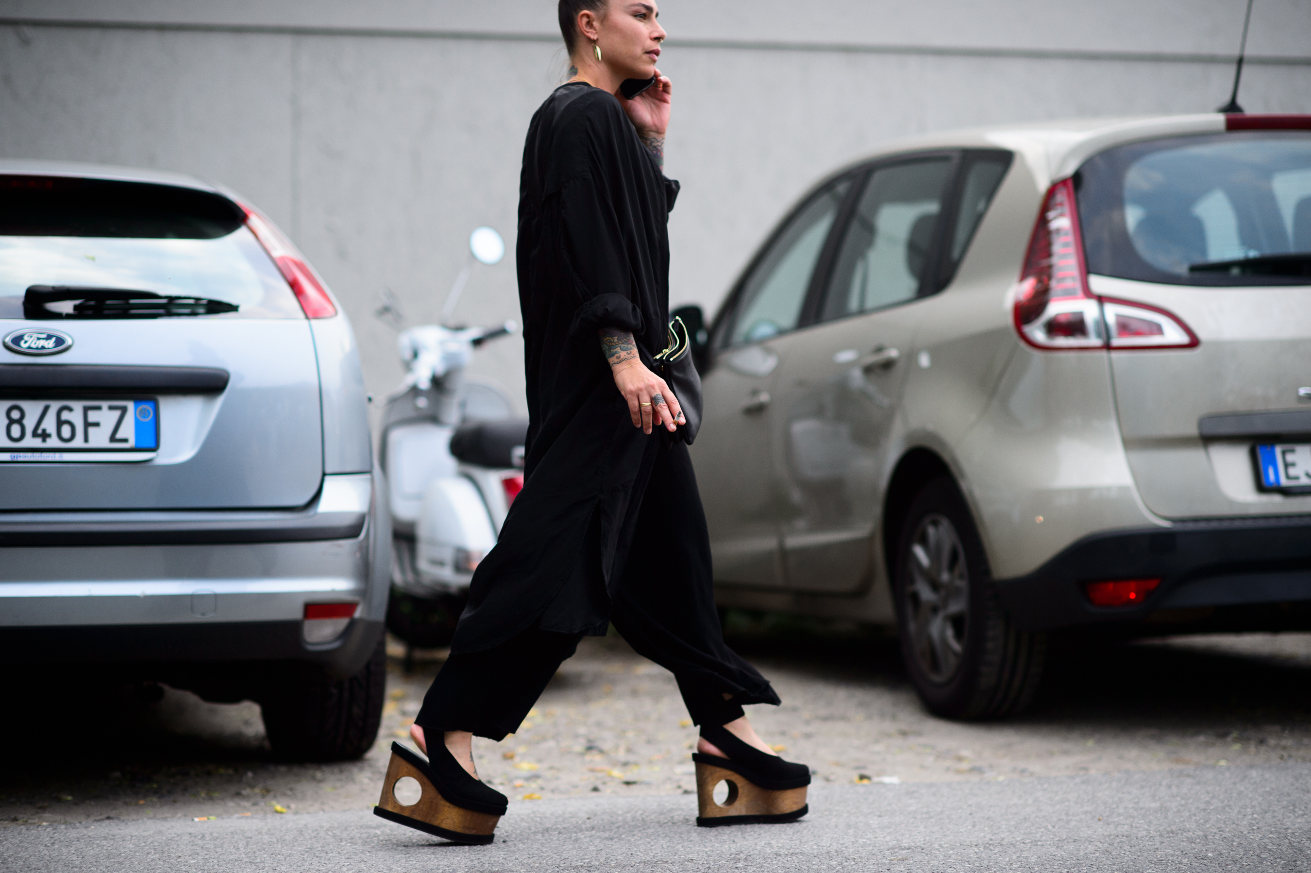 Woman wearing wedges with holes before the show