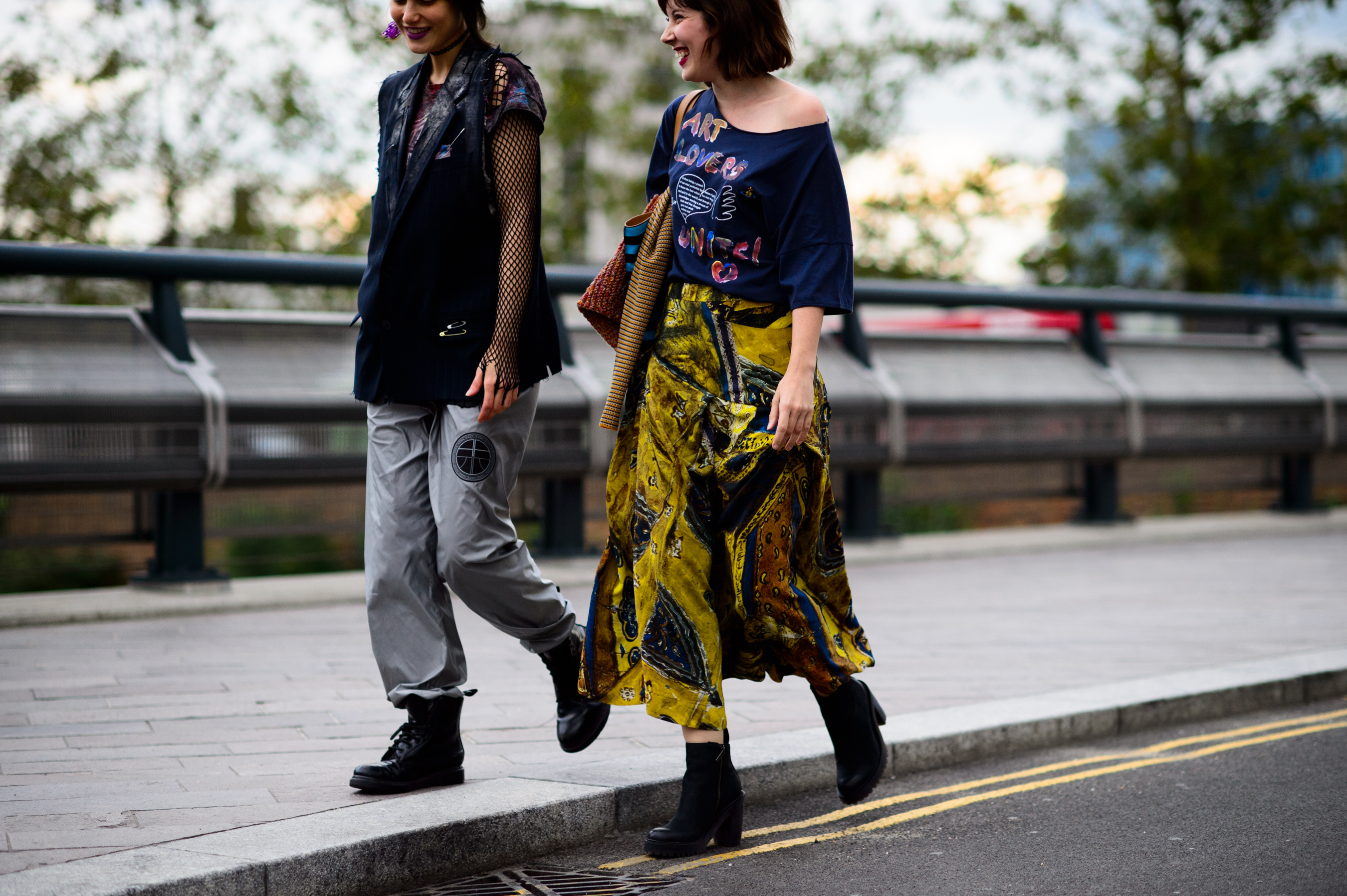 Two women walking into the show