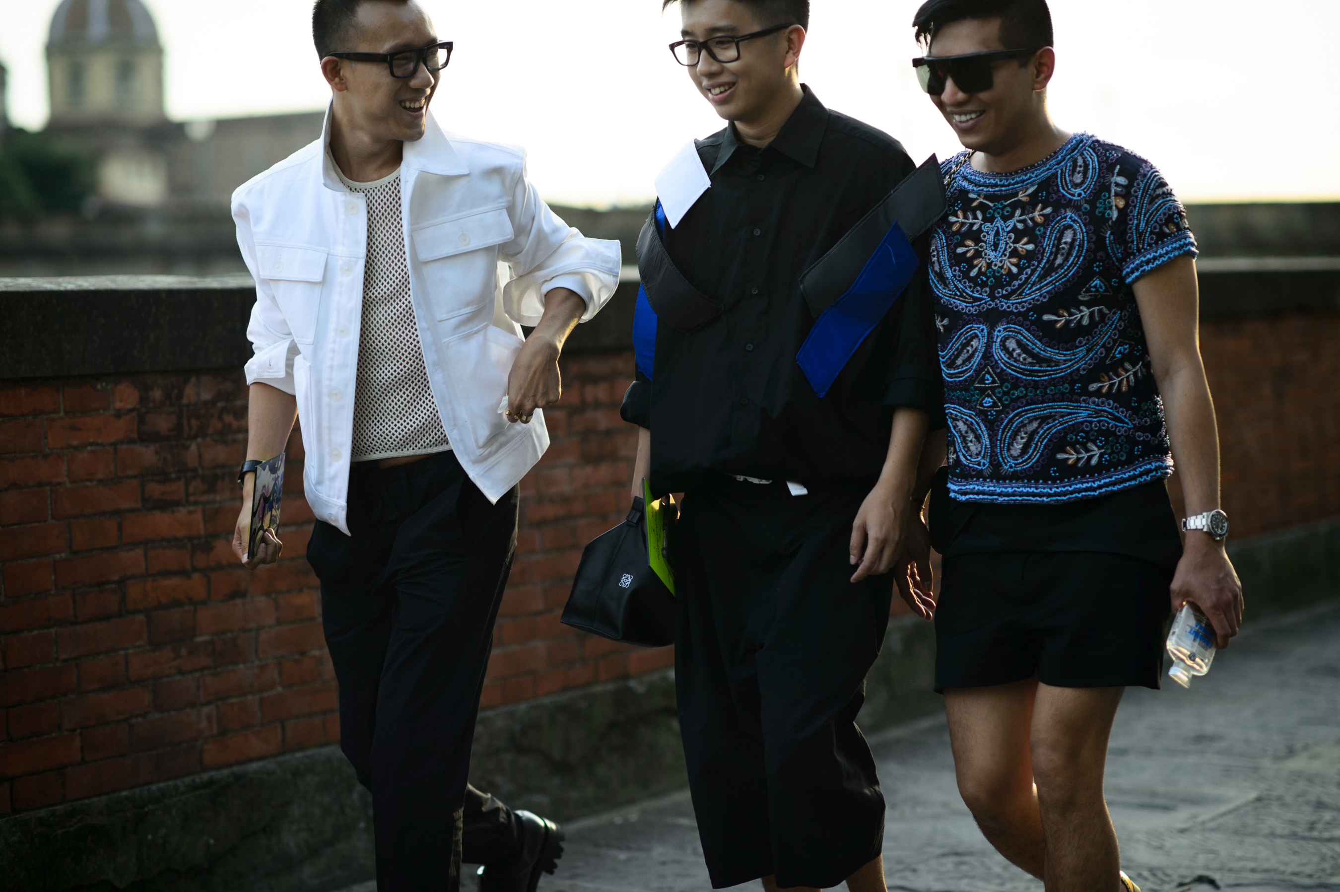 Three Asian men before the show