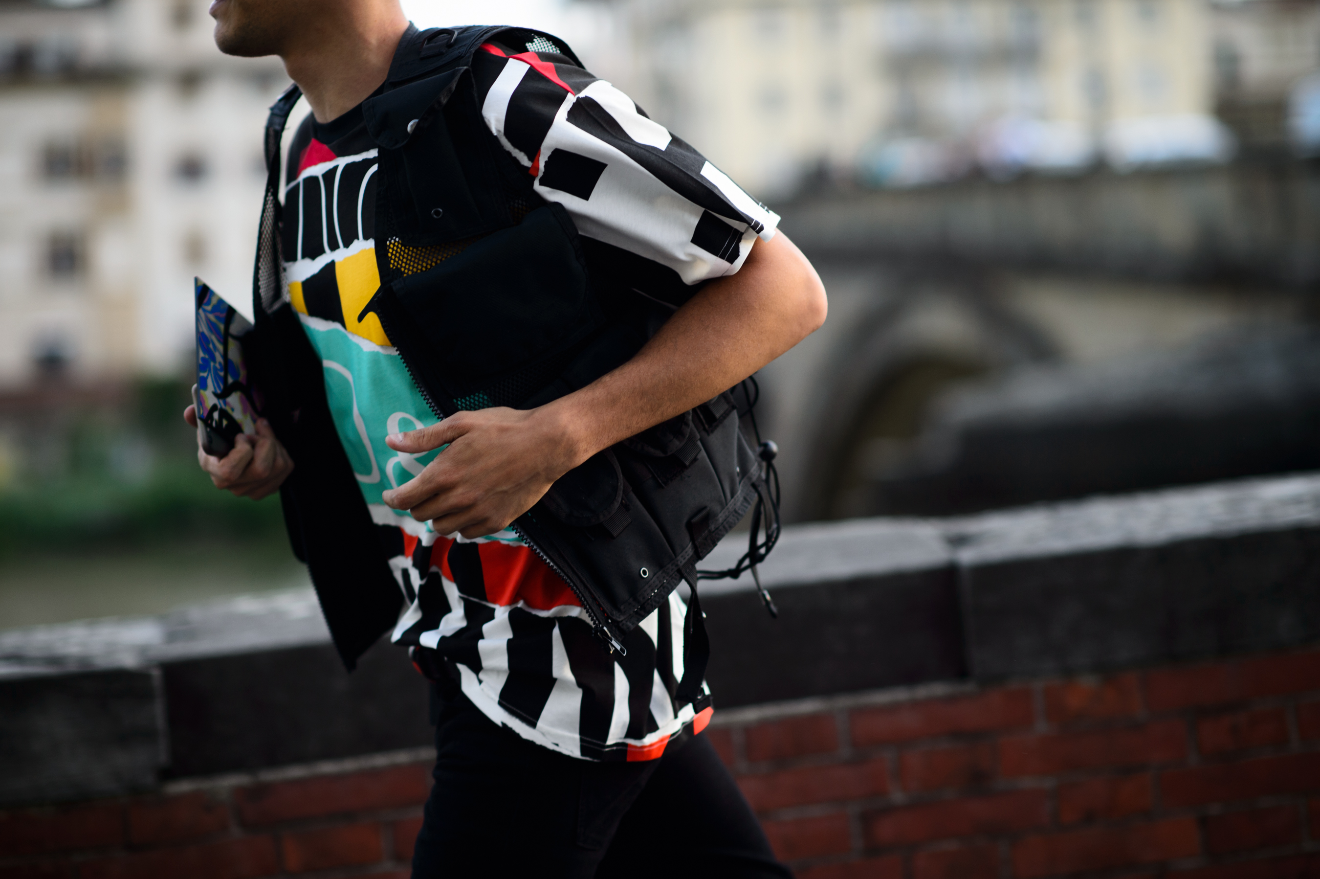Man in colourful shirt and vest