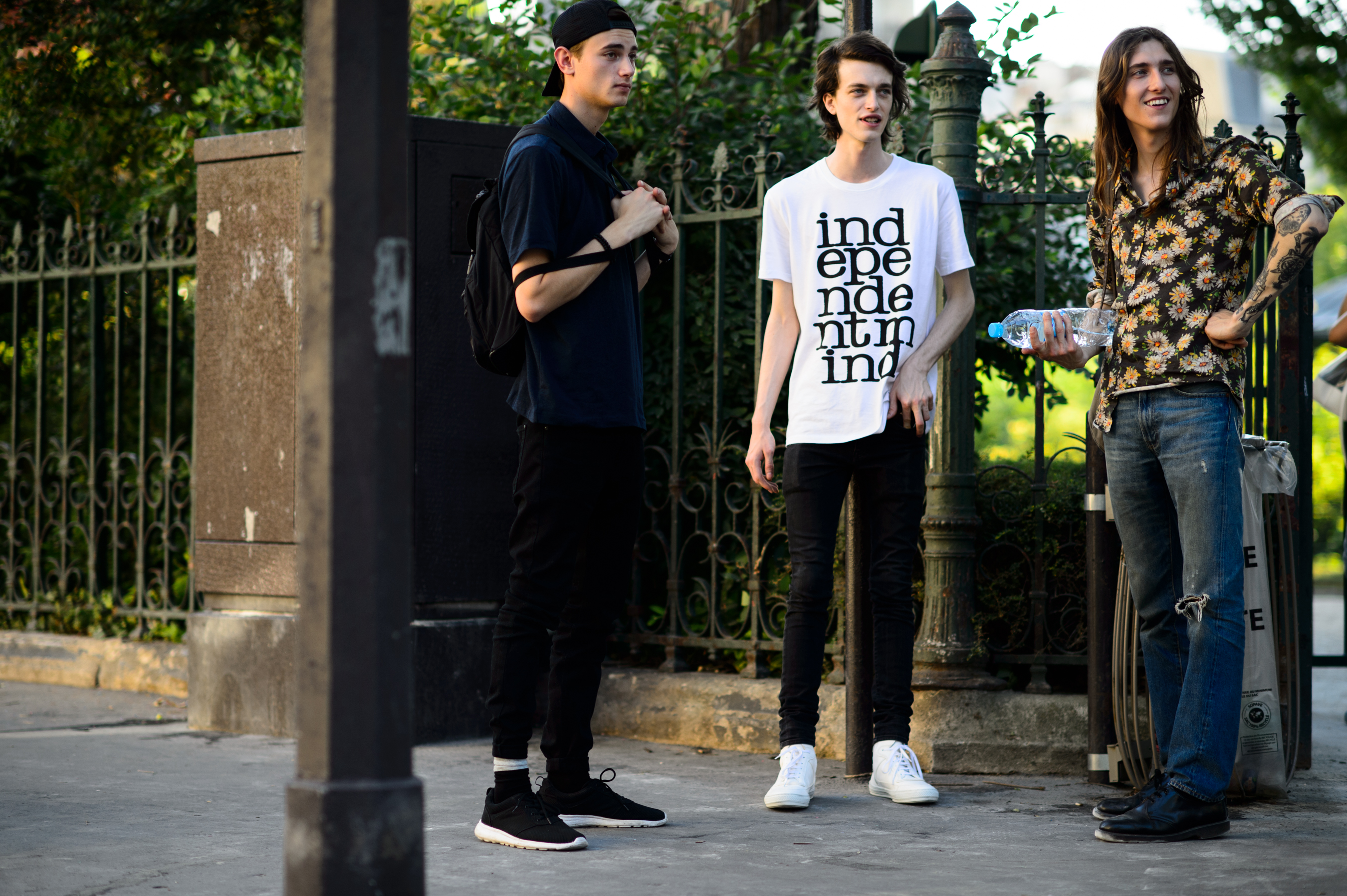 Three male models before the show