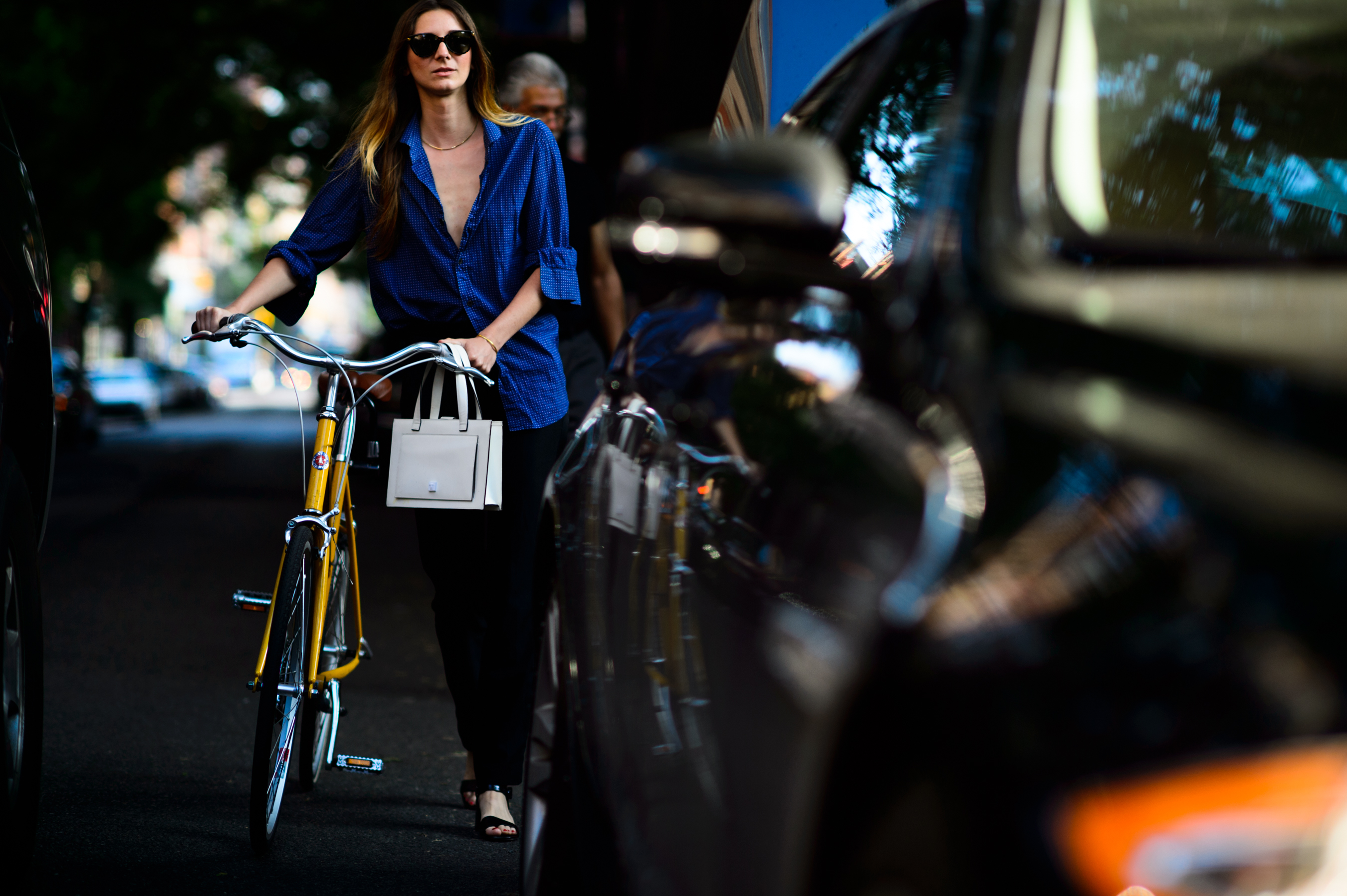 Woman with a bike before resort show
