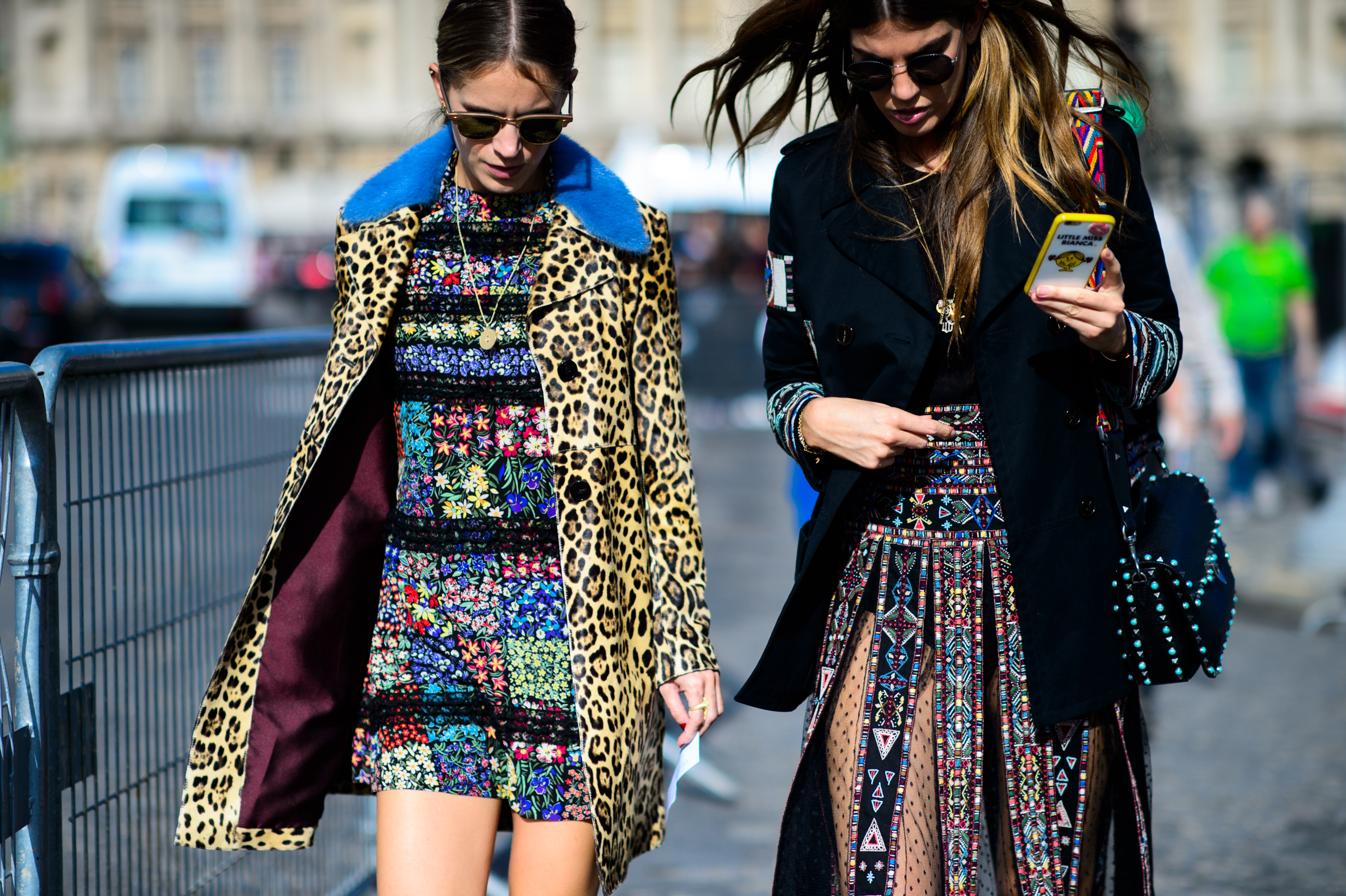 Two women wearing colorful clothes
