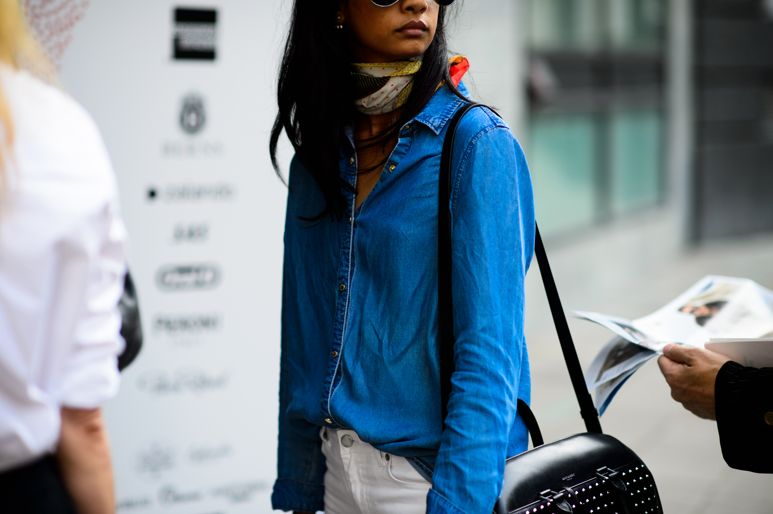 Girl wearing denim shirt and scarf