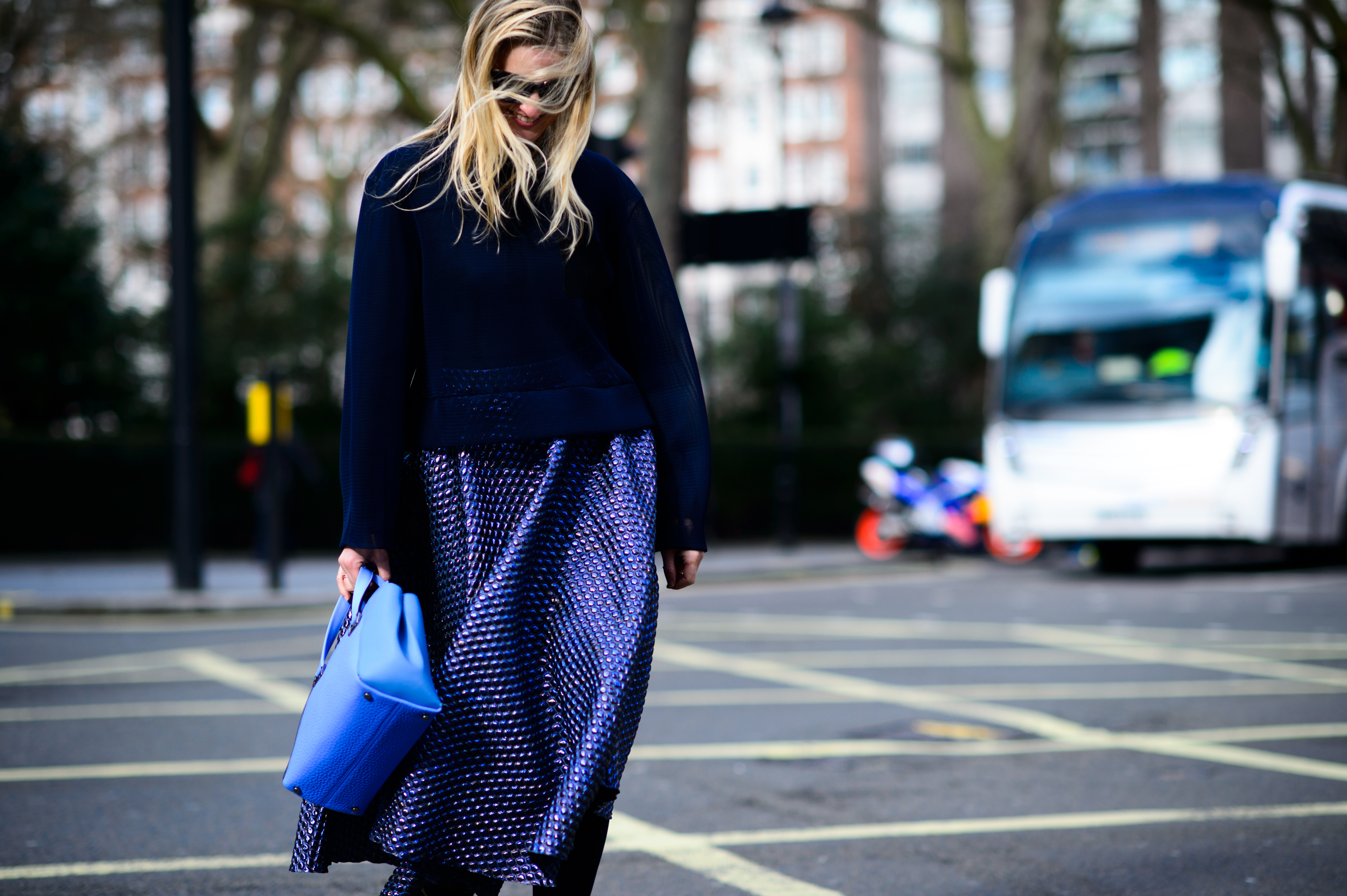 Woman wearing reflective skirt