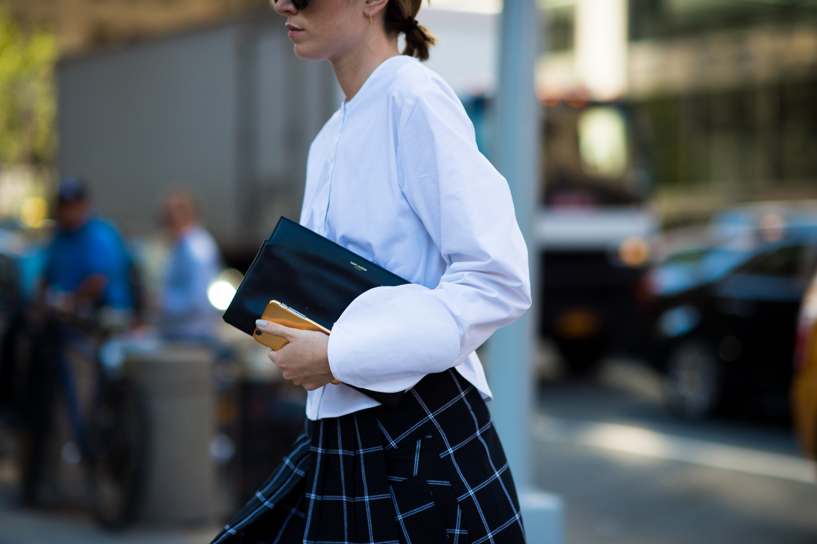 Woman wearing shirt with rounded sleeves