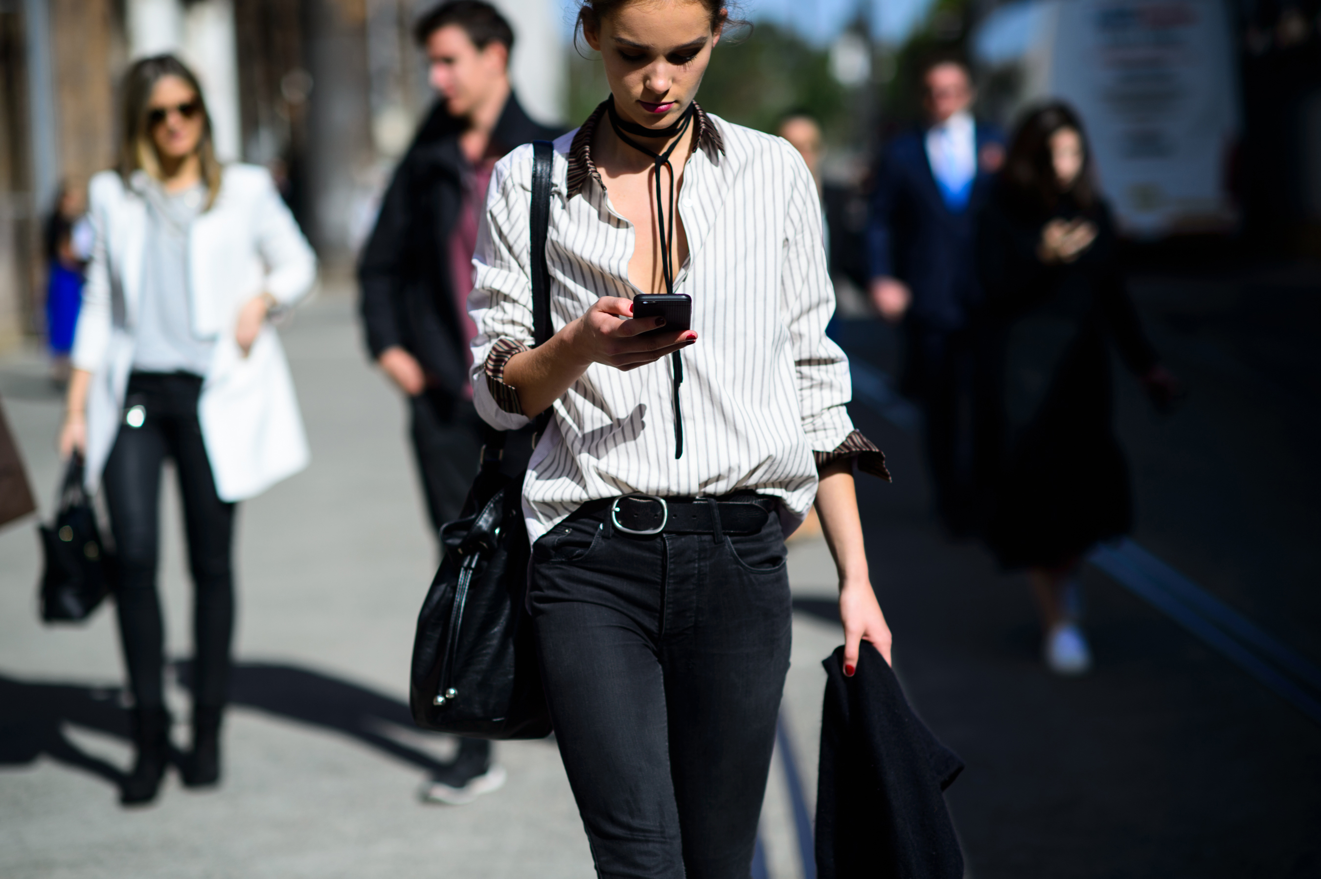 Model wearing shirt with stripes after the show