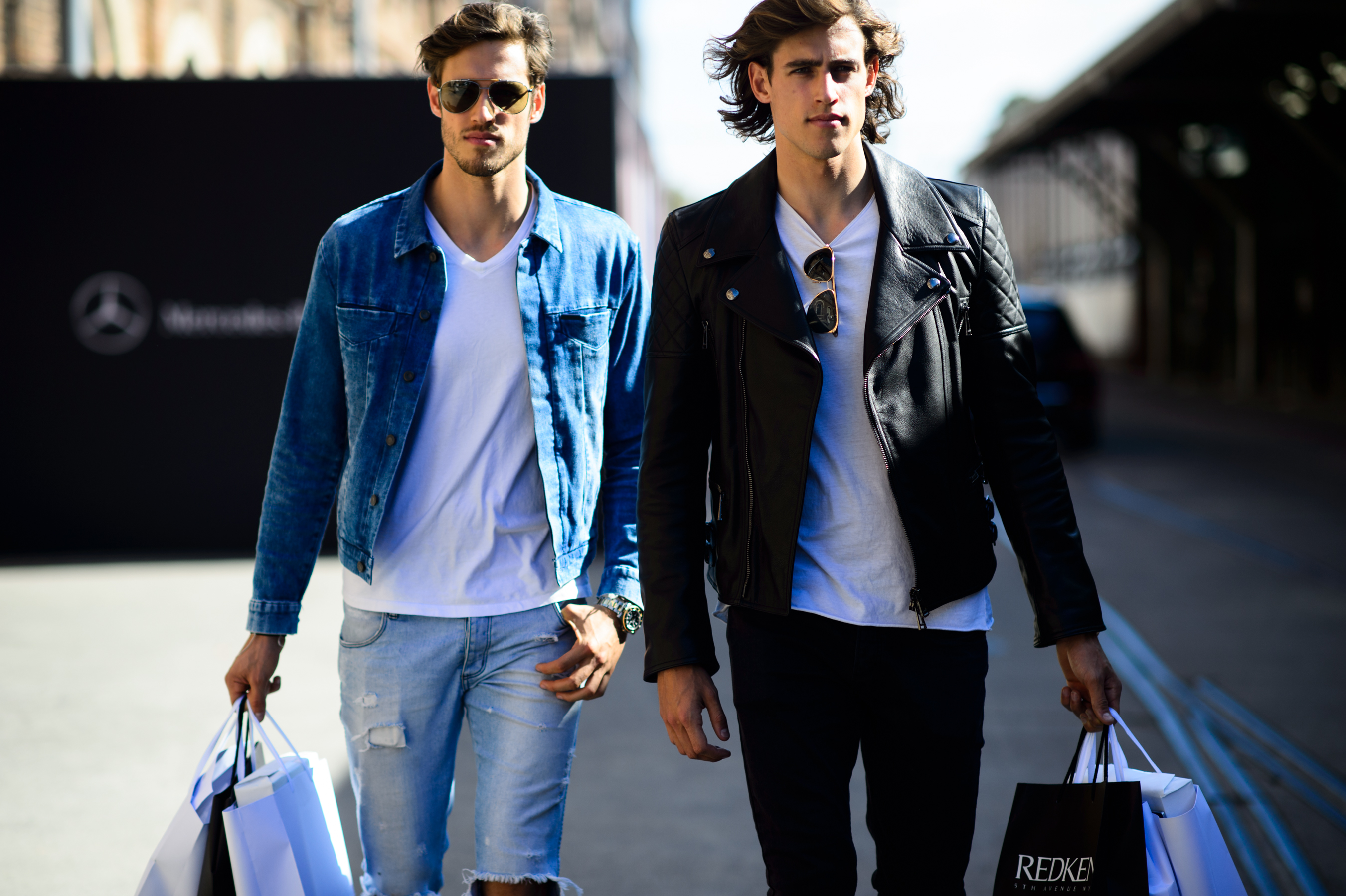 Two male models in white t-shirts
