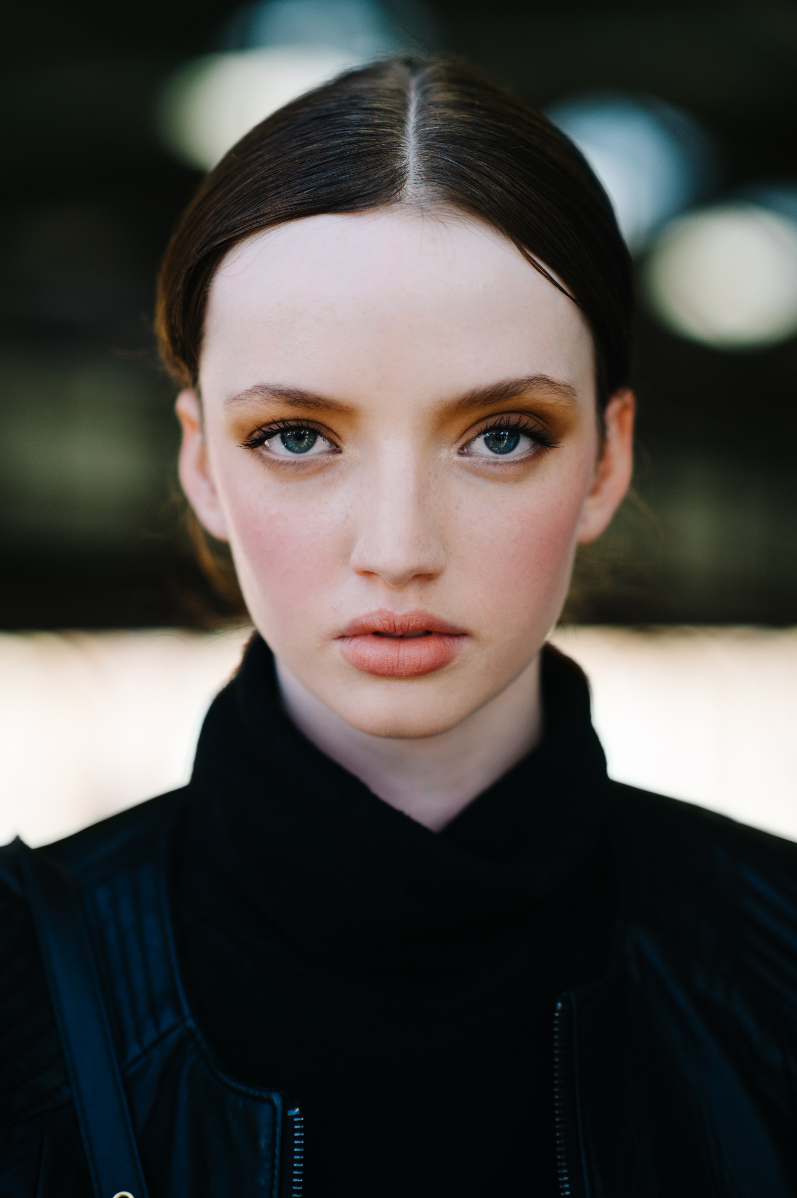 Portrait of a model with blush and hair tied