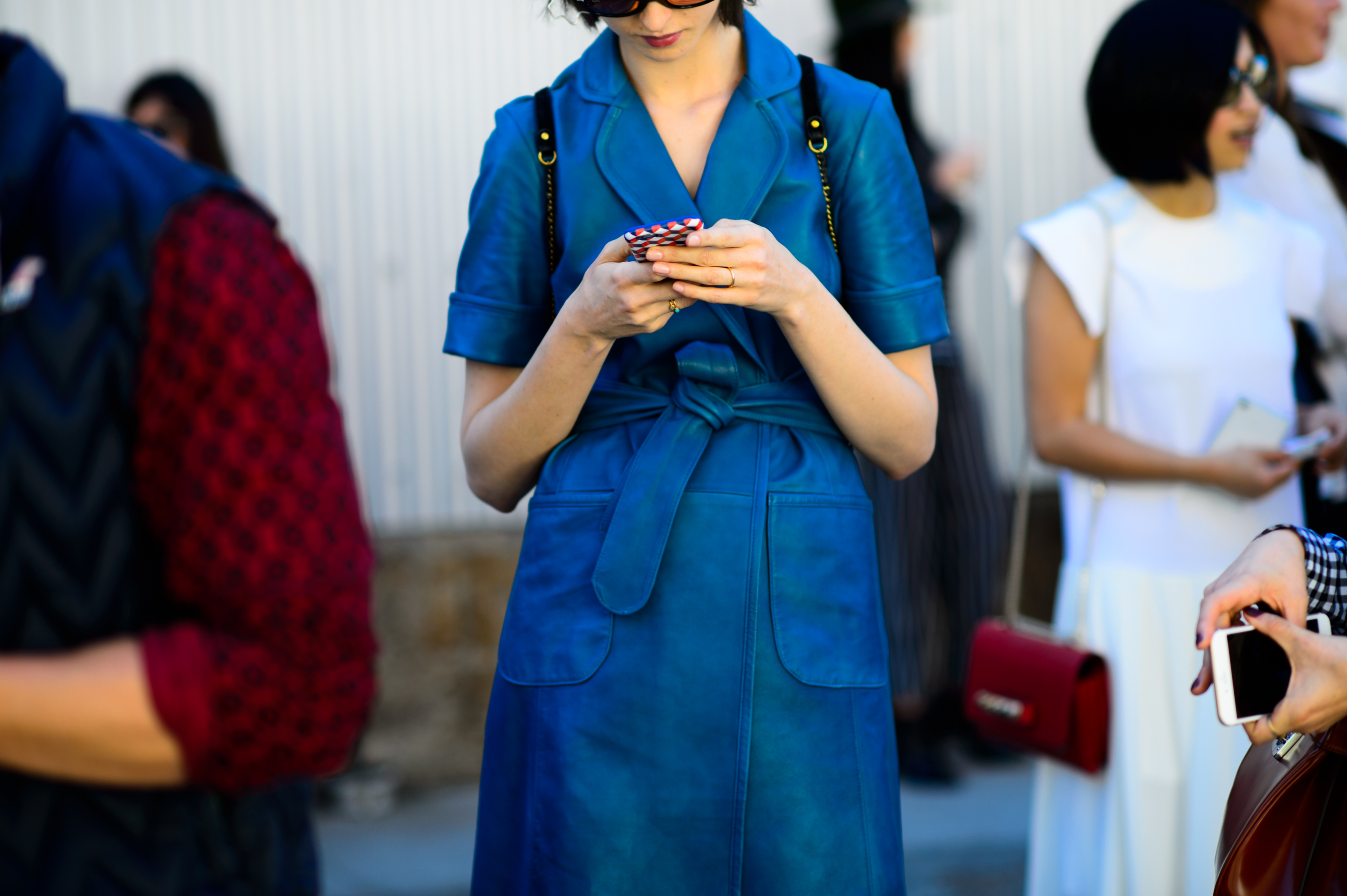 Woman wearing blue leather coat