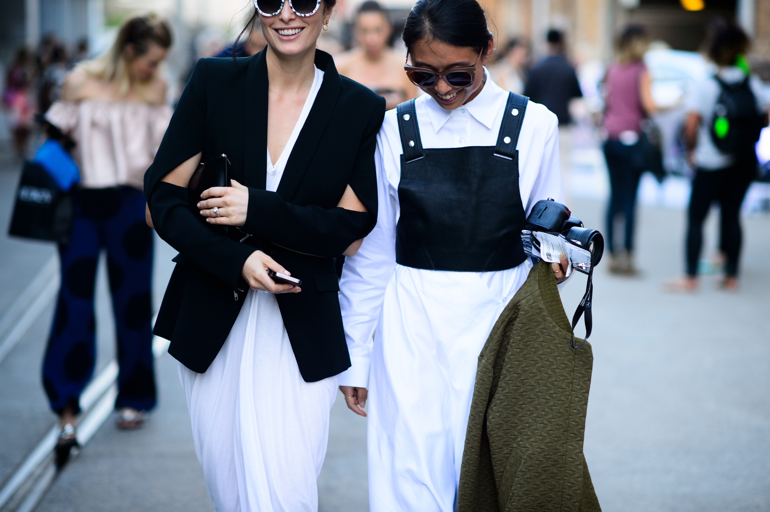 Two women walking together after the show