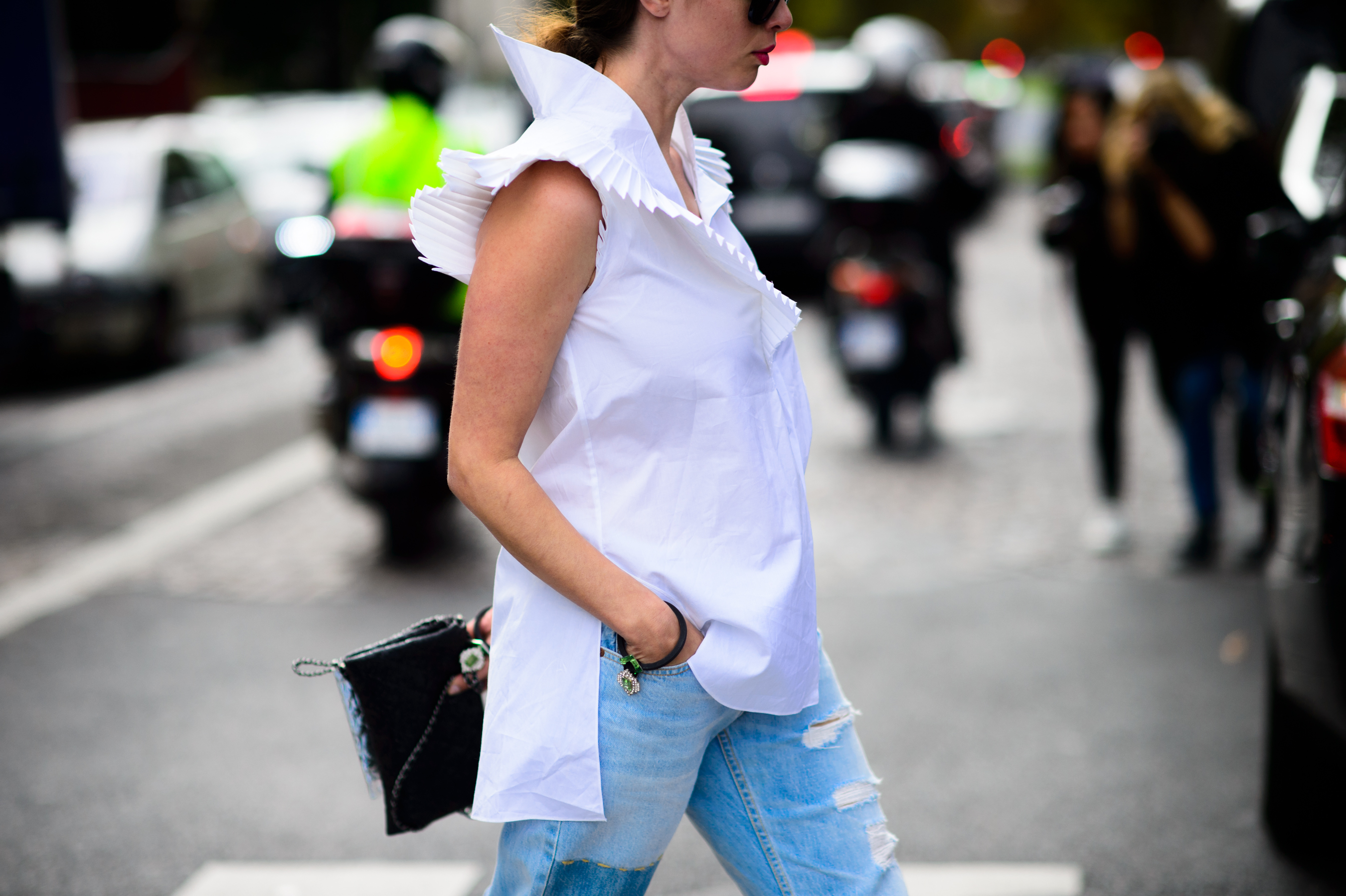 Woman wearing white shirt and jeans