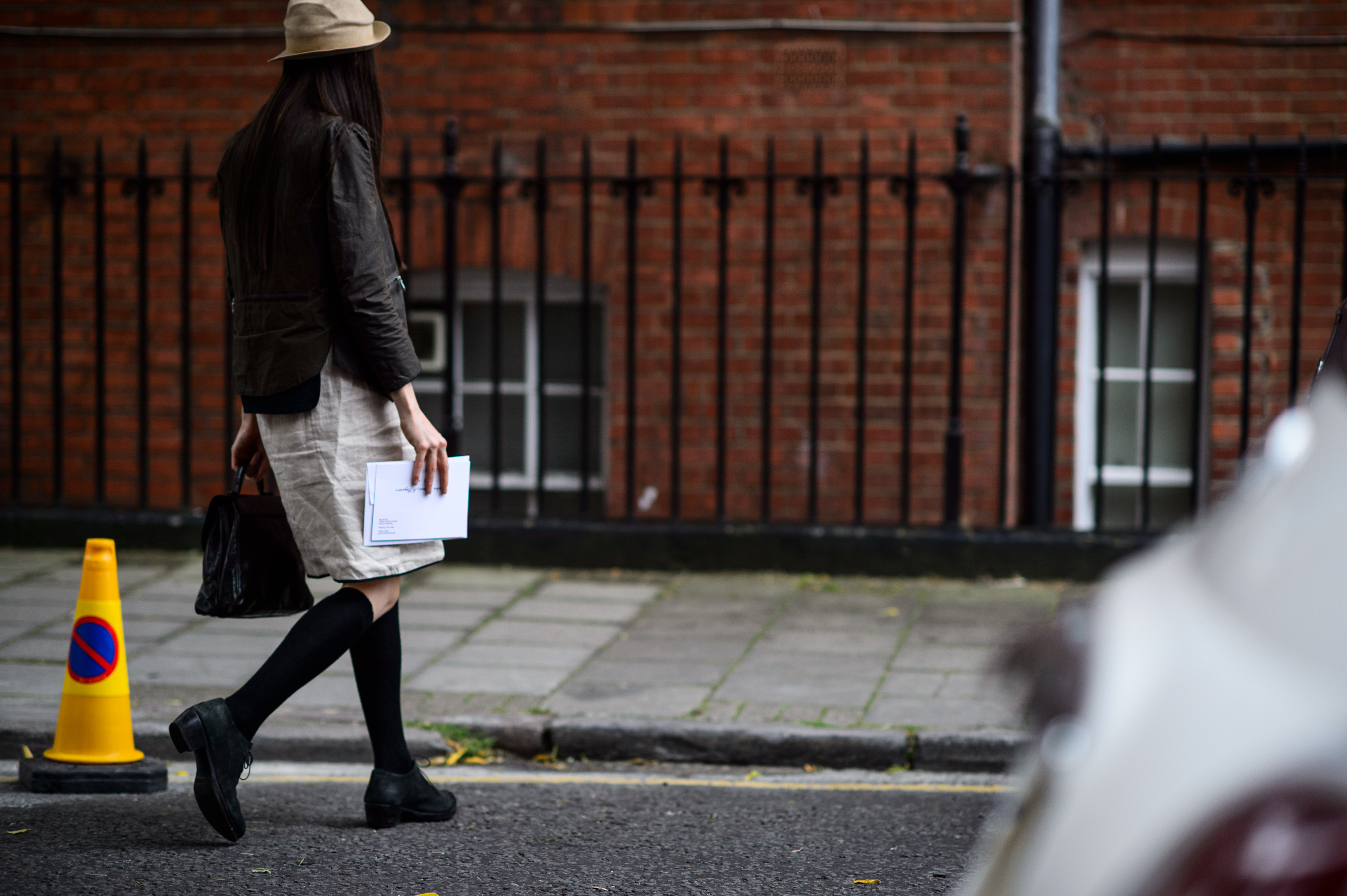 Woman wearing vintage outfit and hat