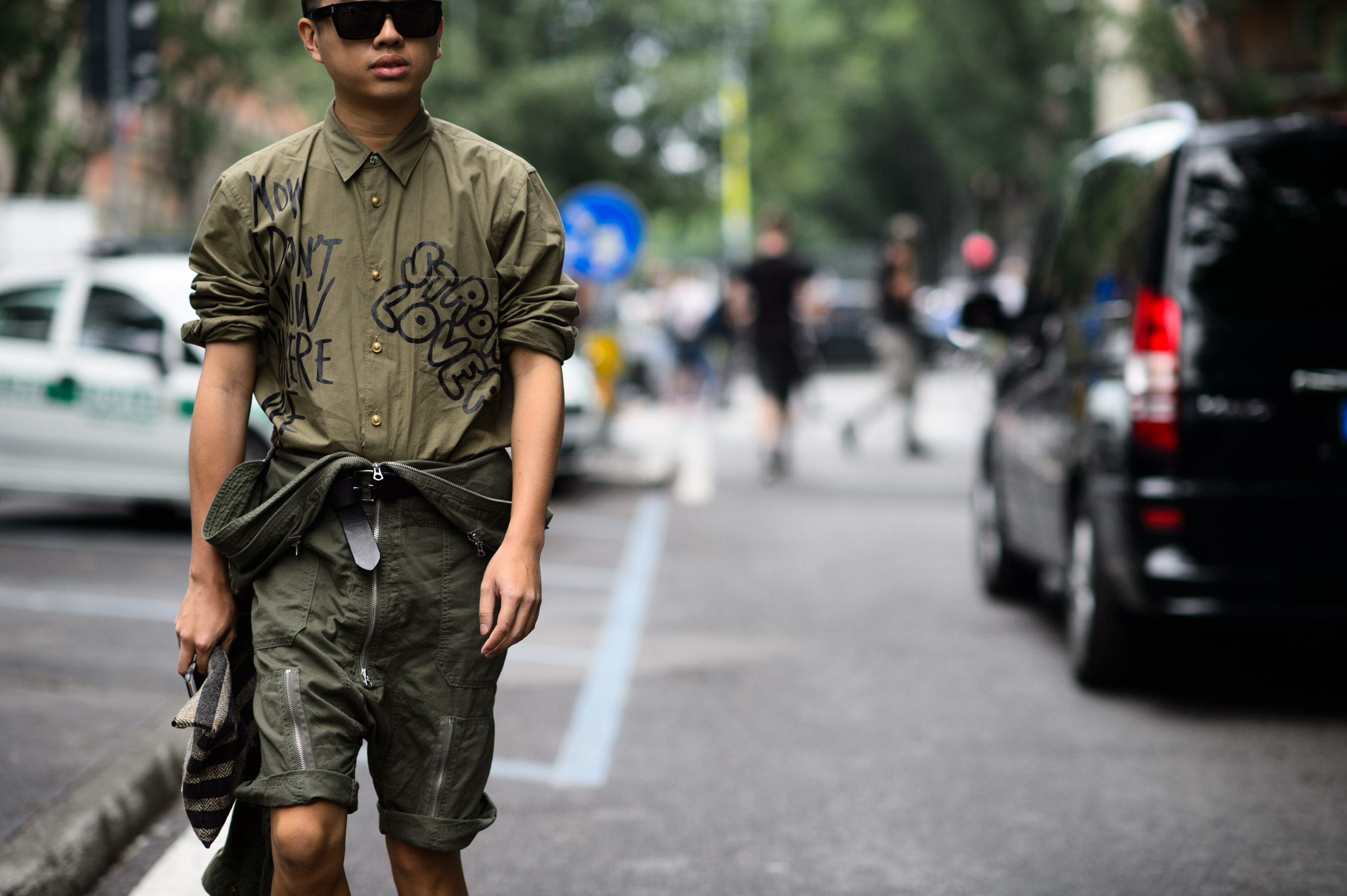Men's Uno fashion director wearing khaki outfit before Giorgio Armani