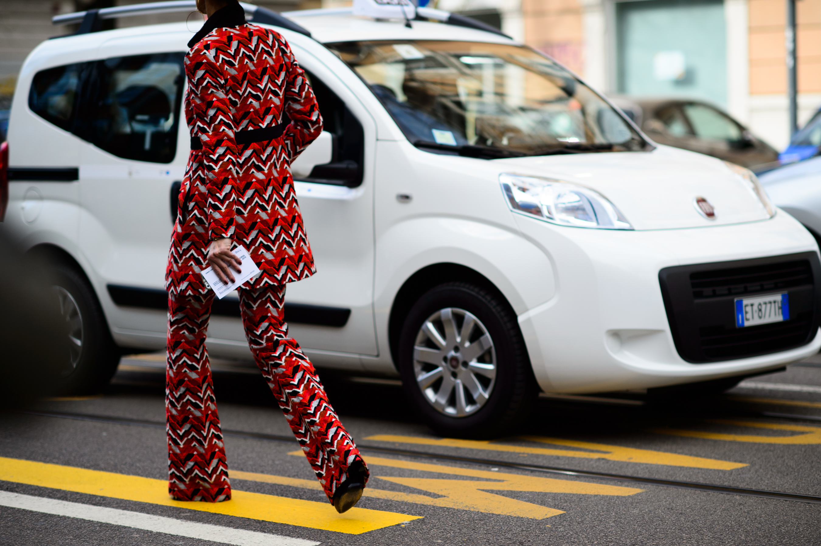 French woman wearing printed suit