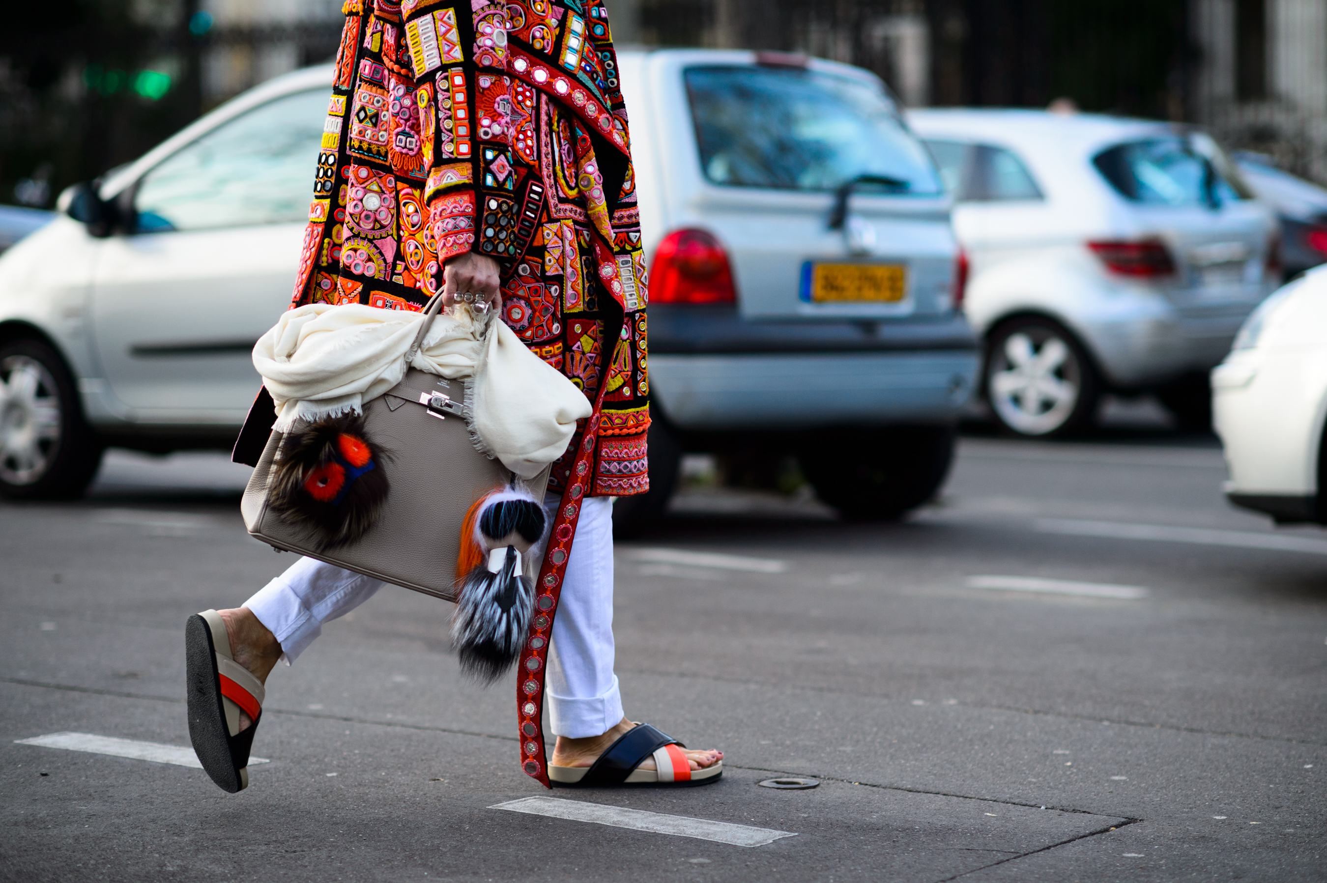 French stylist and buyer wearing colourful coat