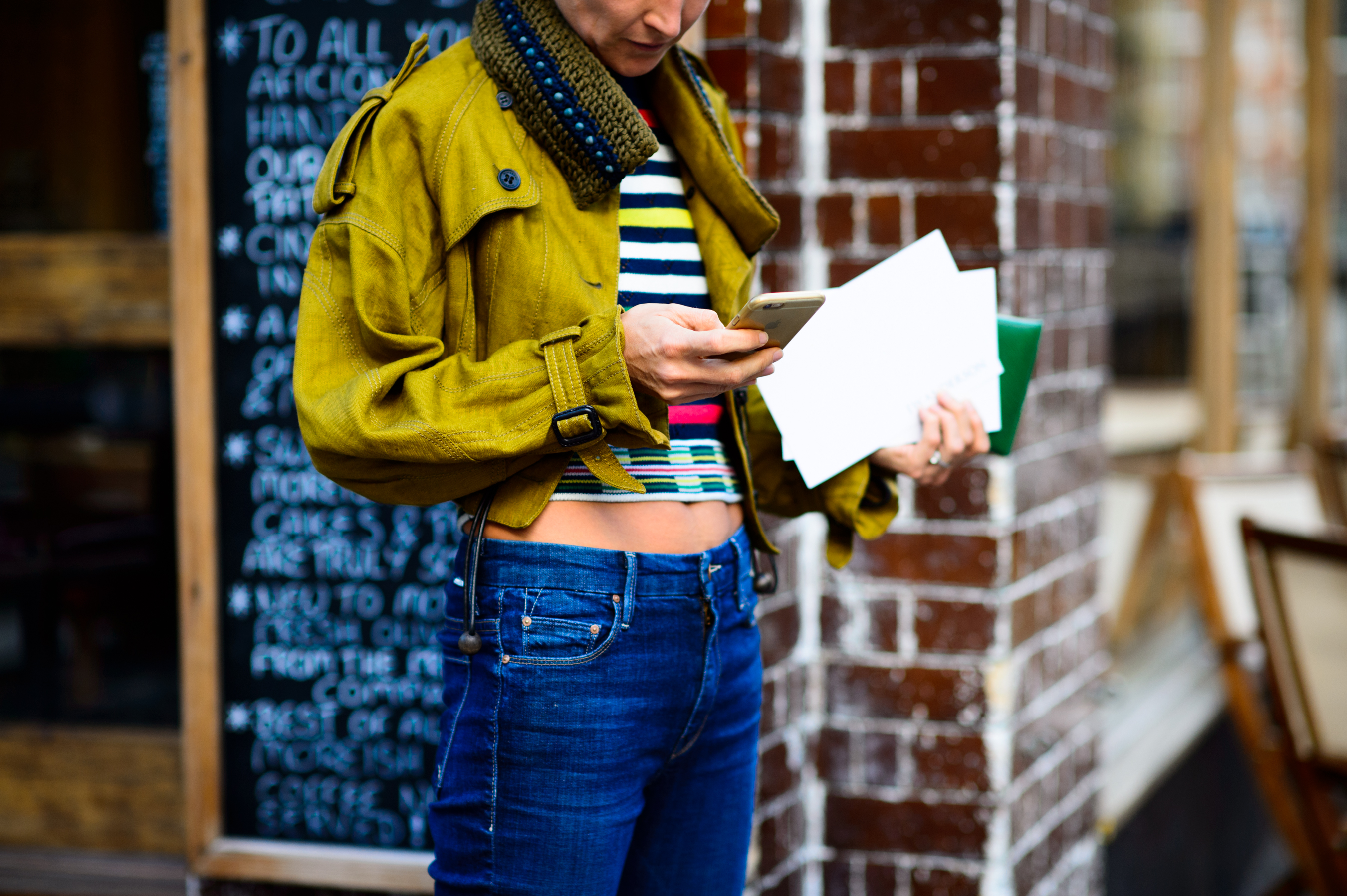 Woman wearing green jacket