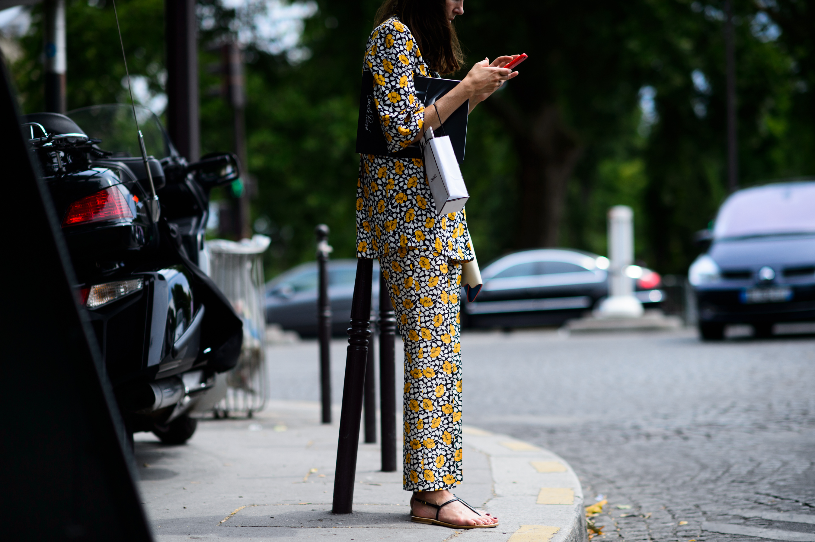 Woman wearing suit with print and sandals