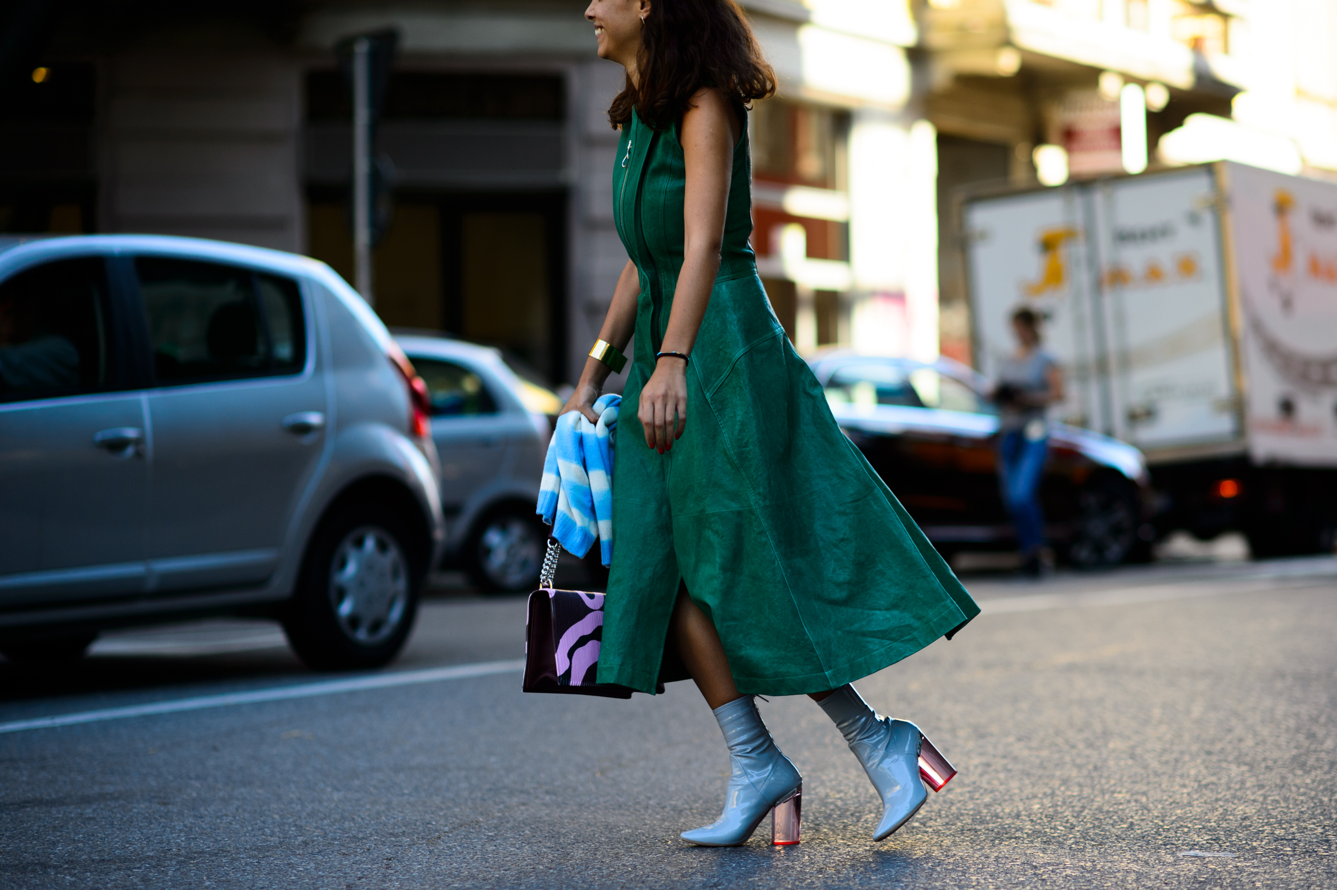 Woman wearing greed suede dress