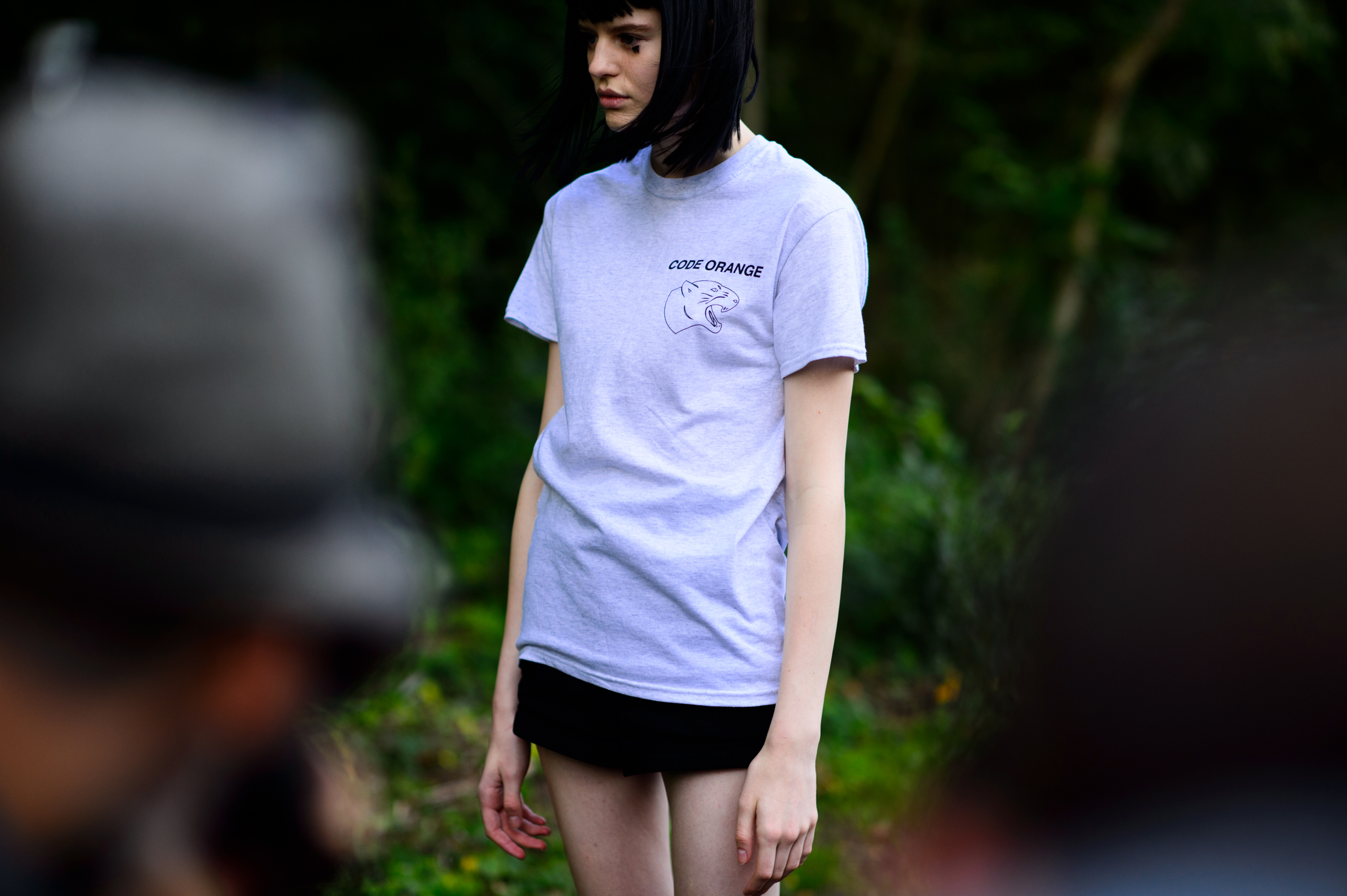 Model wearing code orange shirt after Louis Vuitton show