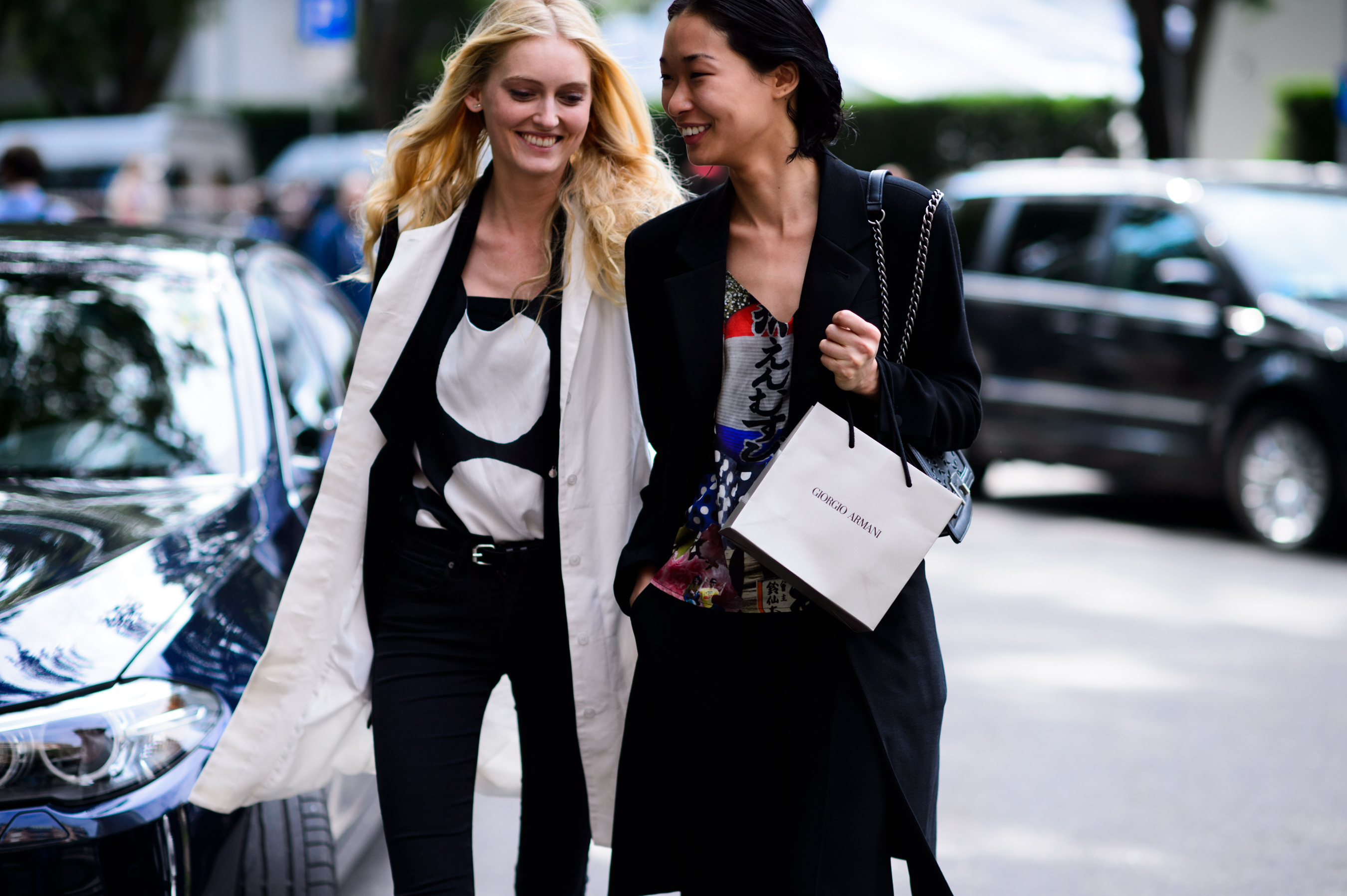 Two models after Armani show