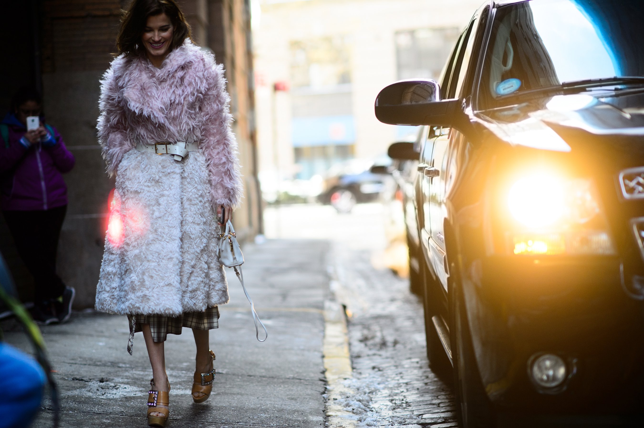 Woman wearing pink coat