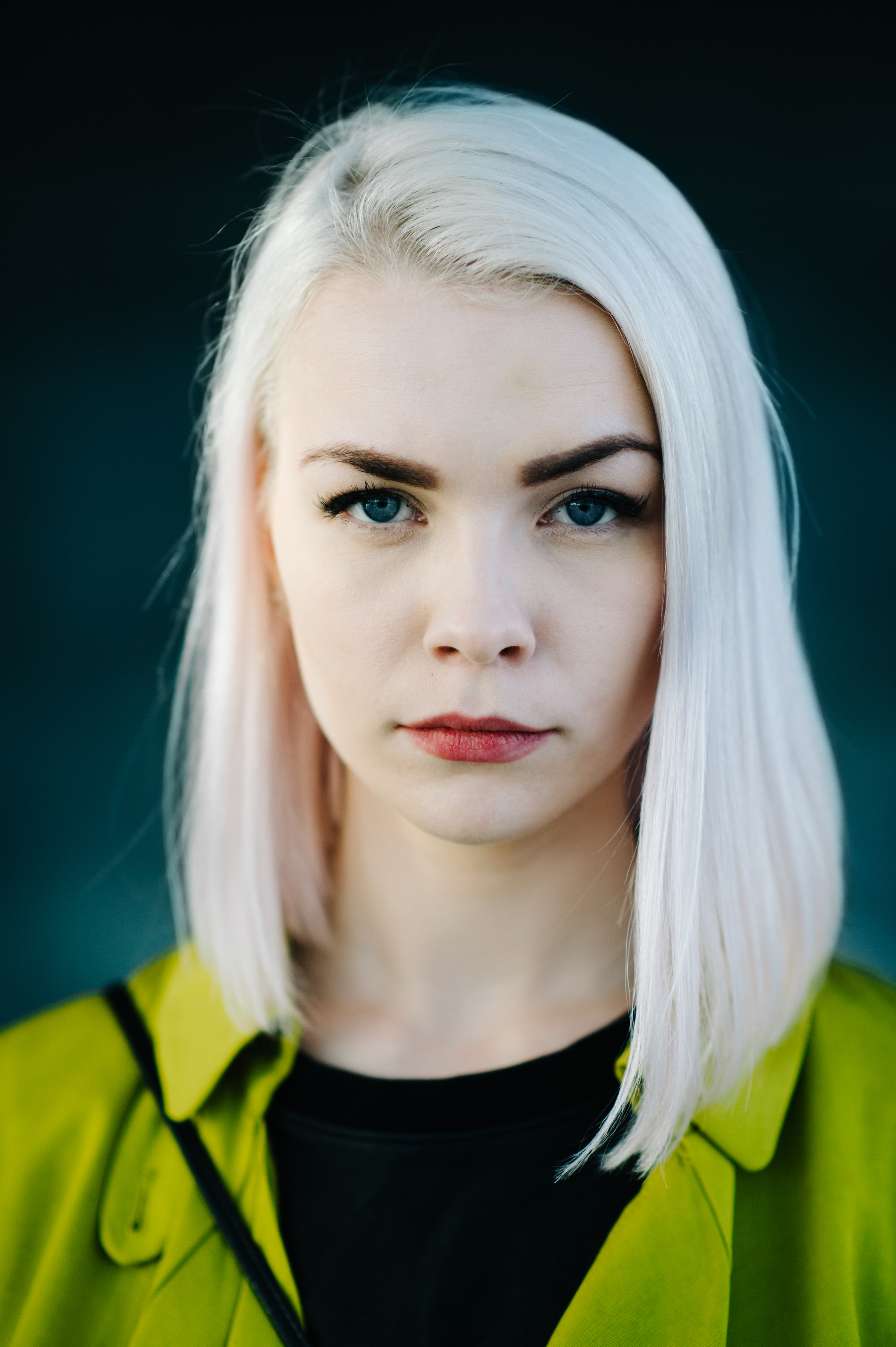 Portrait of a girl with blue eyes and white hair