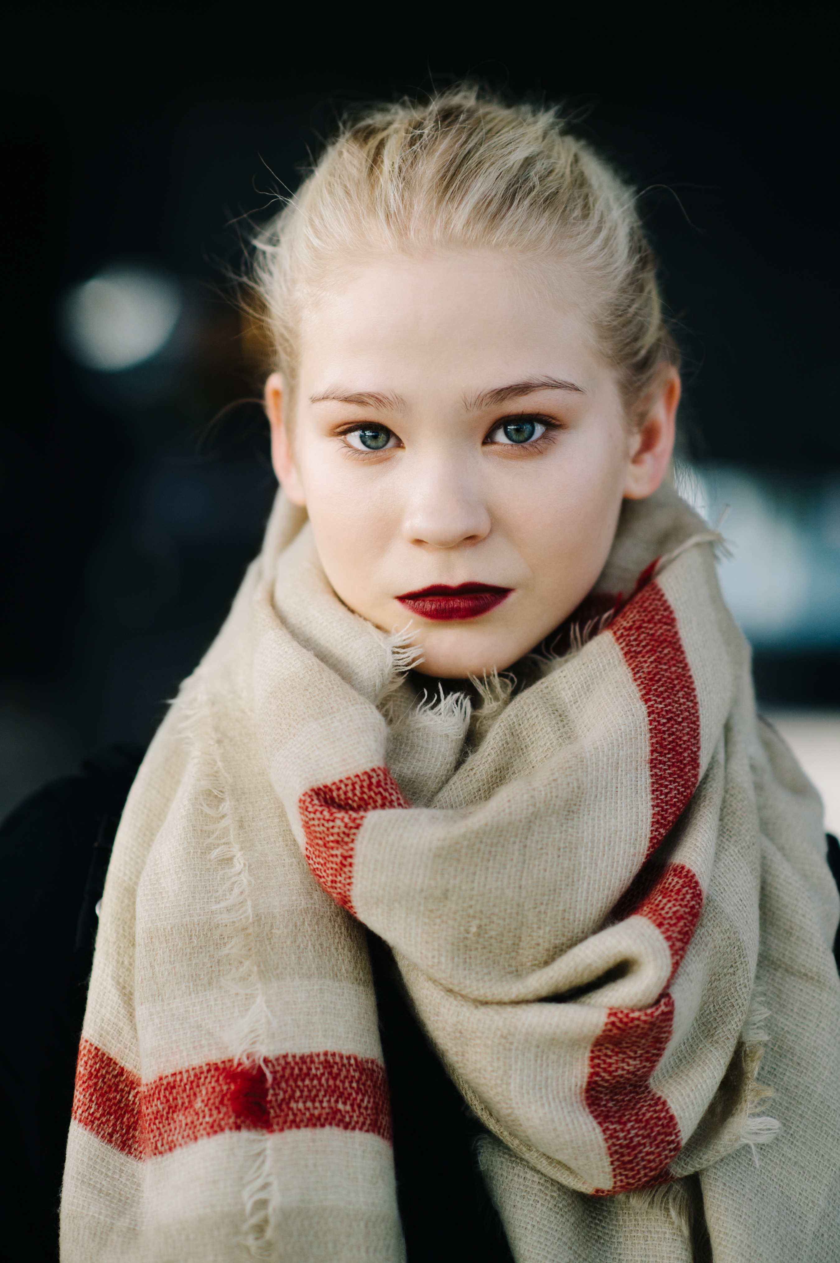 Portrait of a girl with scar on forehead