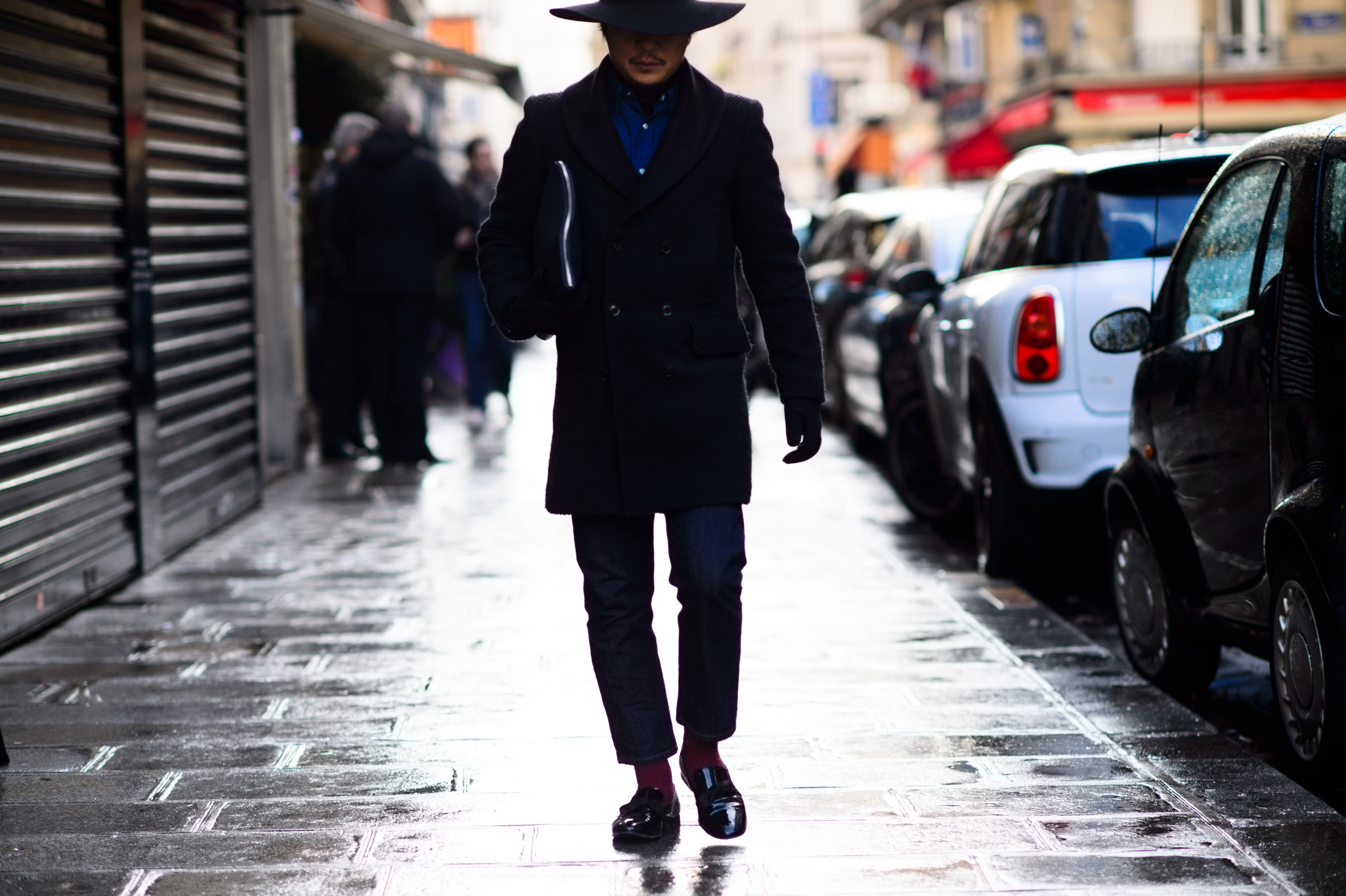 Japanese man wearing hat and suit