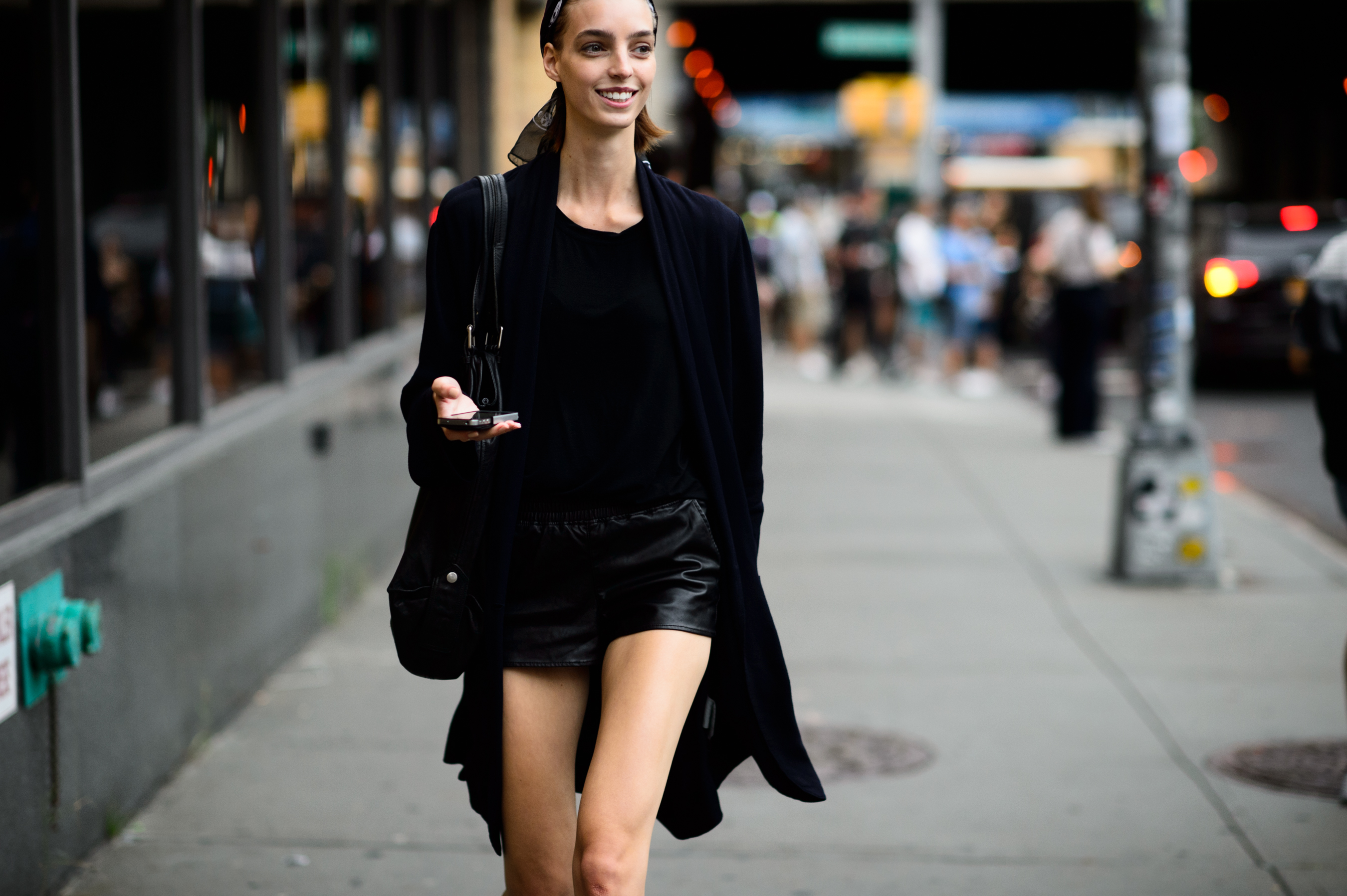 Model wearing black after the show