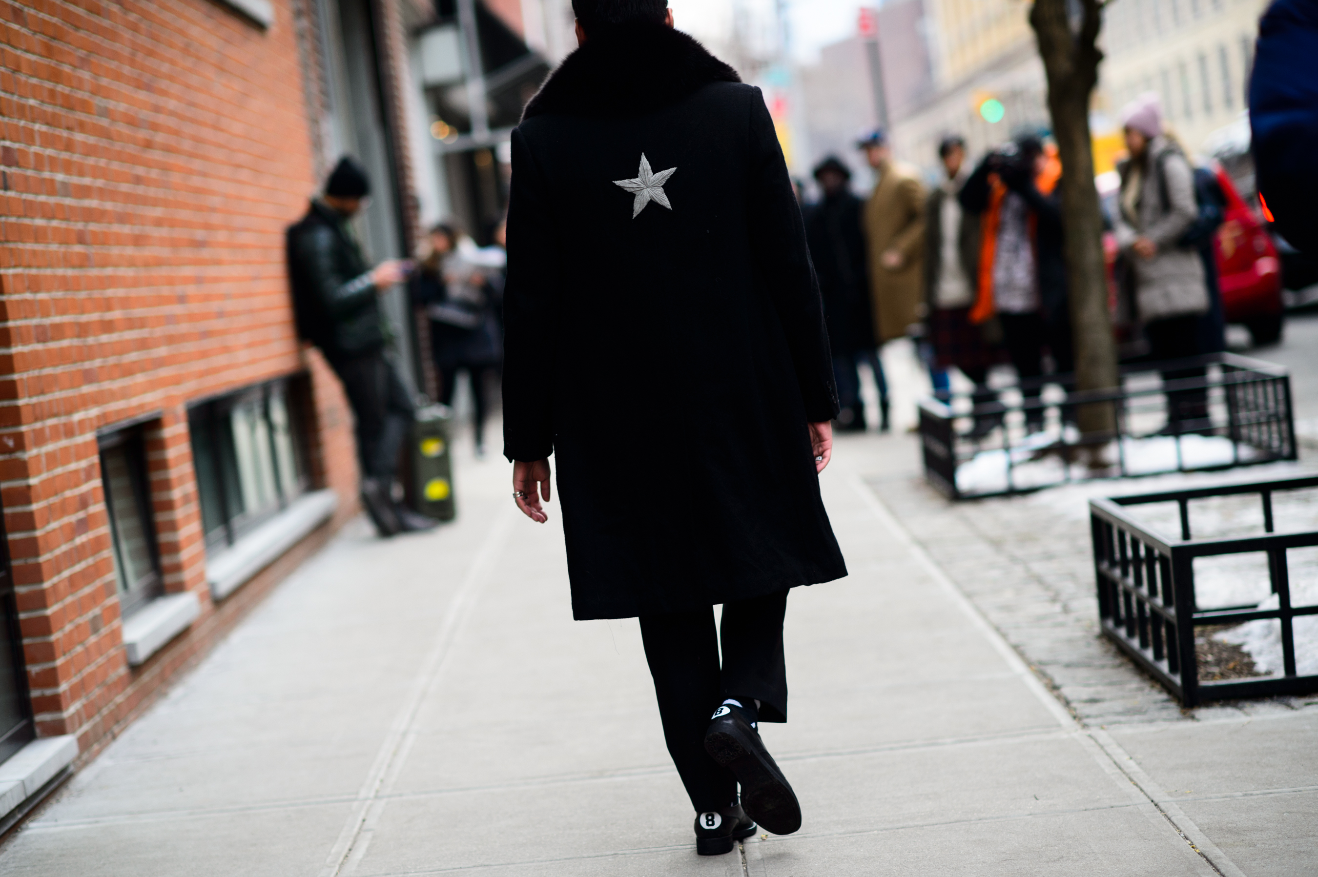 Man wearing star on the back of the coat